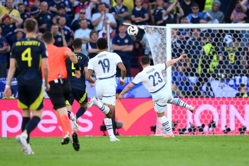 Xherdan Shaqiri curls in a sublime equaliser