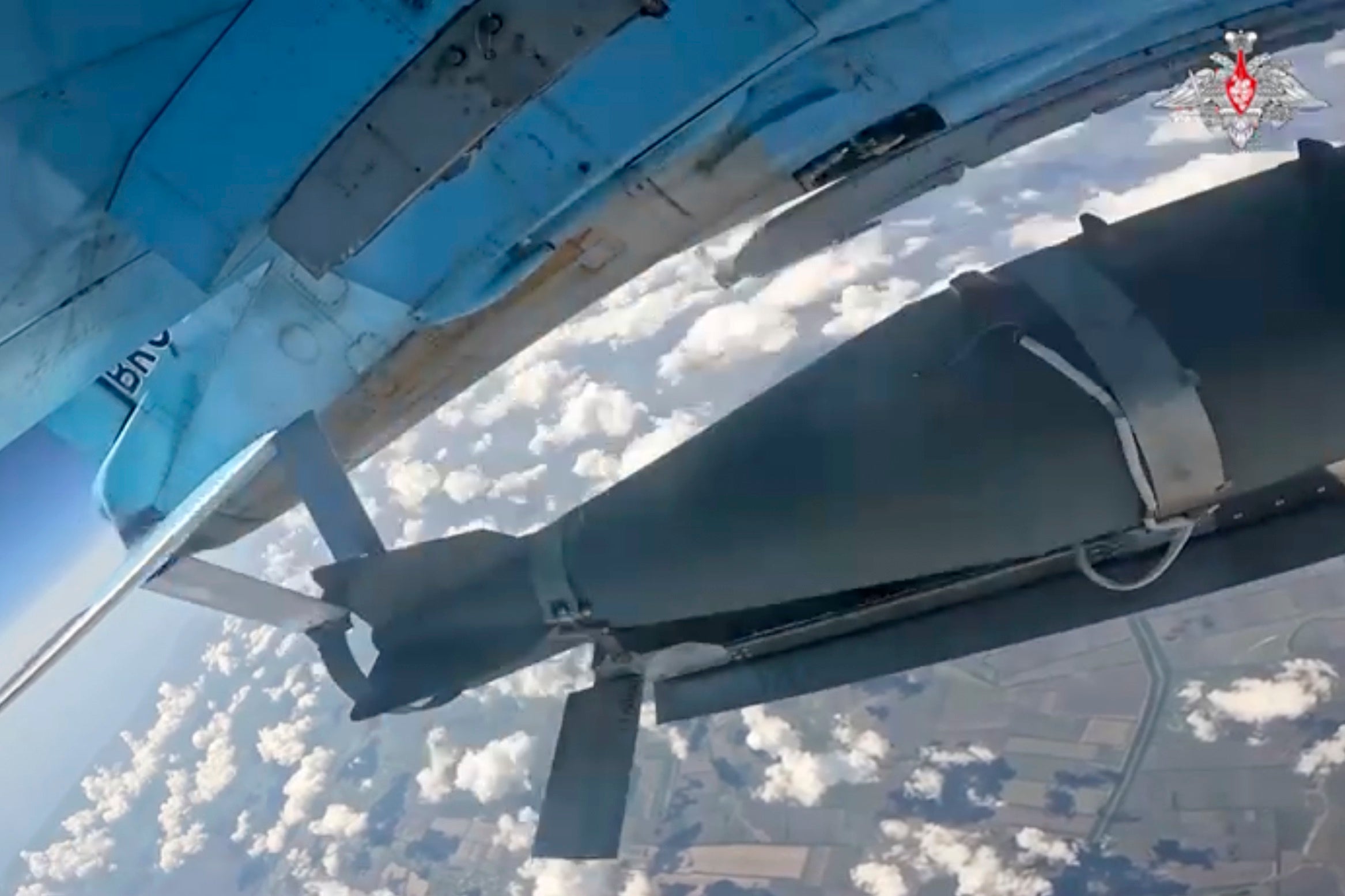 Photo from an undated video released by the Russia shows a glide-guided bomb being released by a Russian air force jet