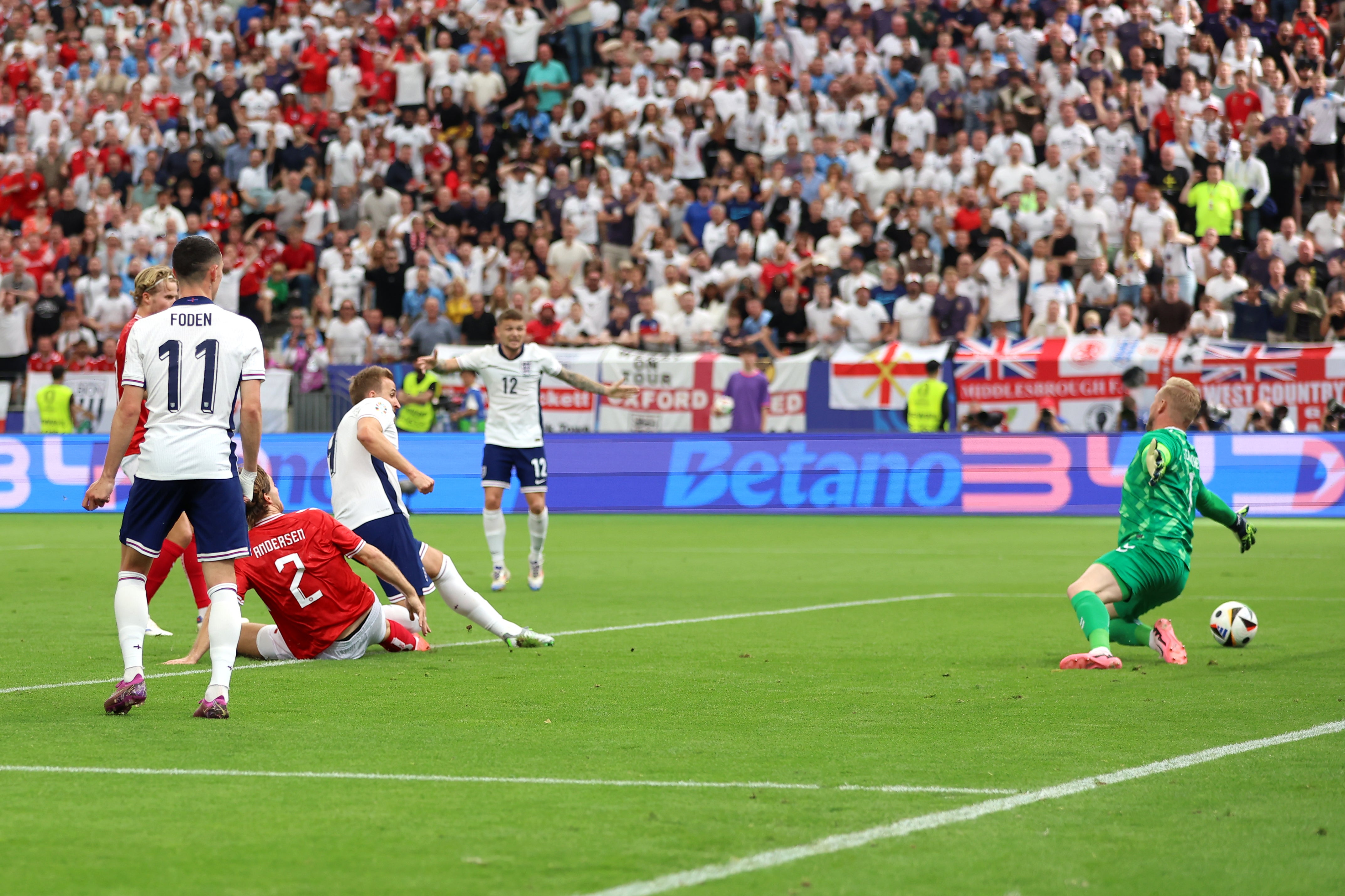 Harry Kane opens the scoring for England against Denmark