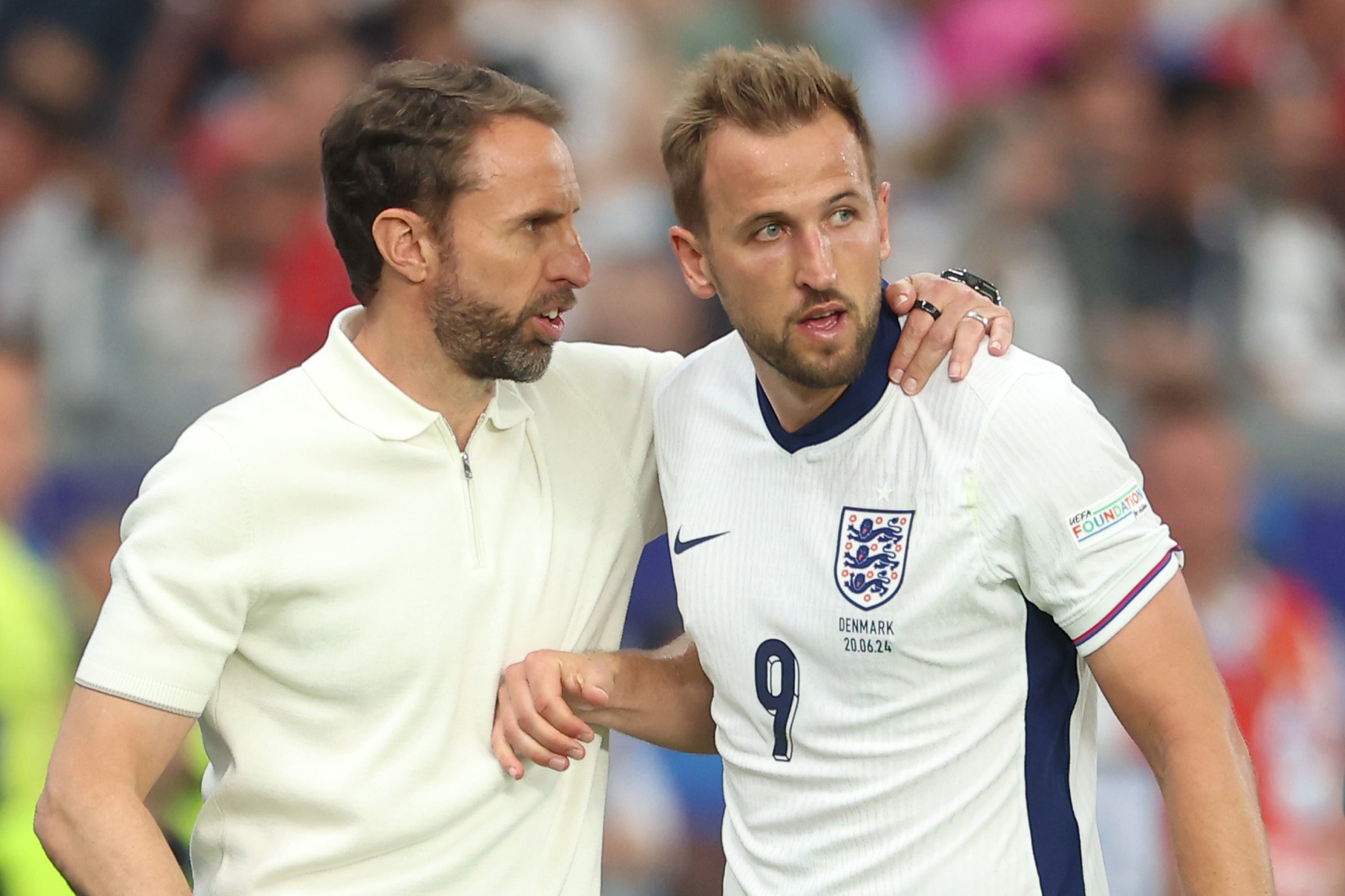 Gareth Southgate consoles Kane after bringing him off