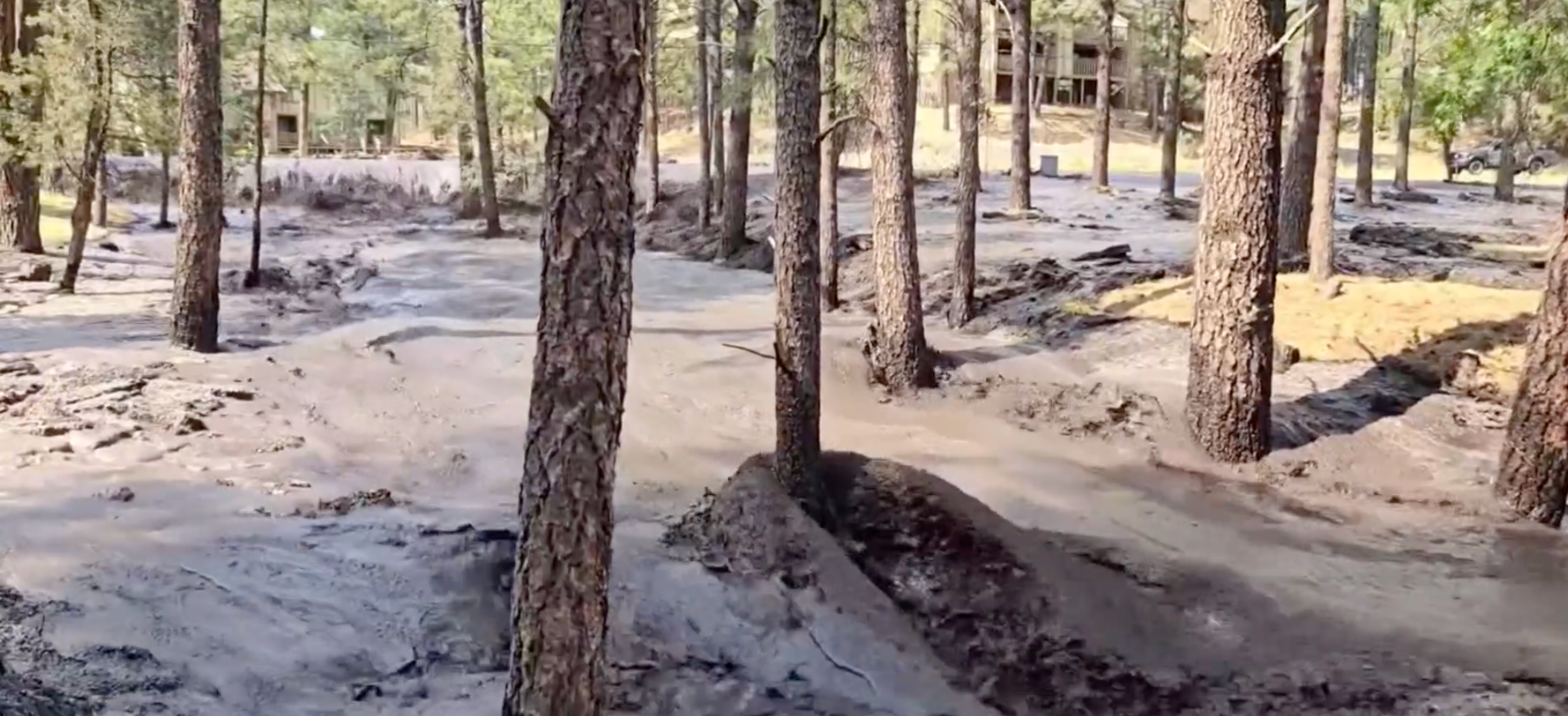 A flash flood rushes through the village of Ruidoso, pictured, in New Mexico. Residents are facing ‘extremely dangerous’ floods while two major fires scorch the region