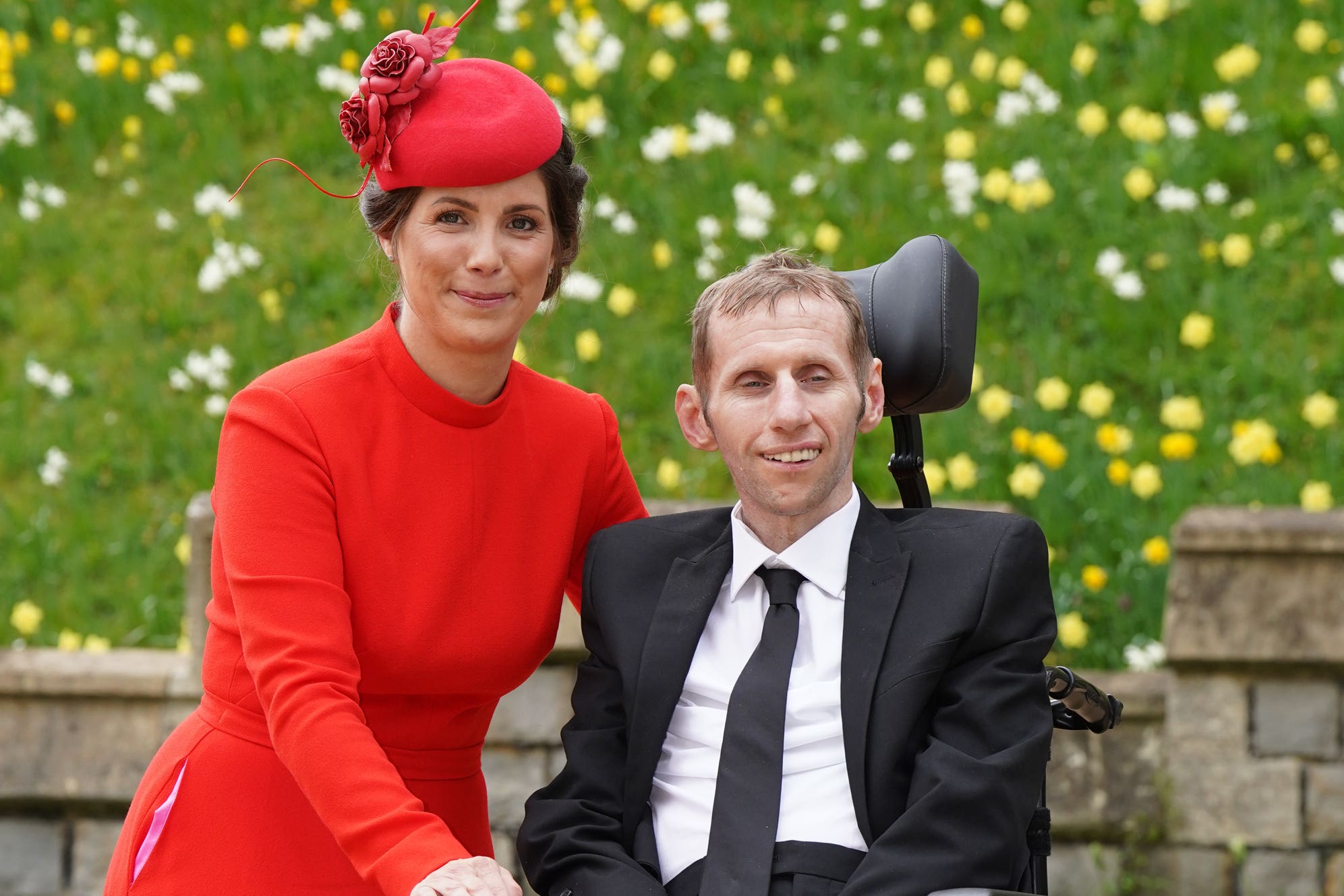 Rob Burrow and his wife Lindsey arriving at Windsor Castle where he was made an MBE (Steve Parsons/PA)