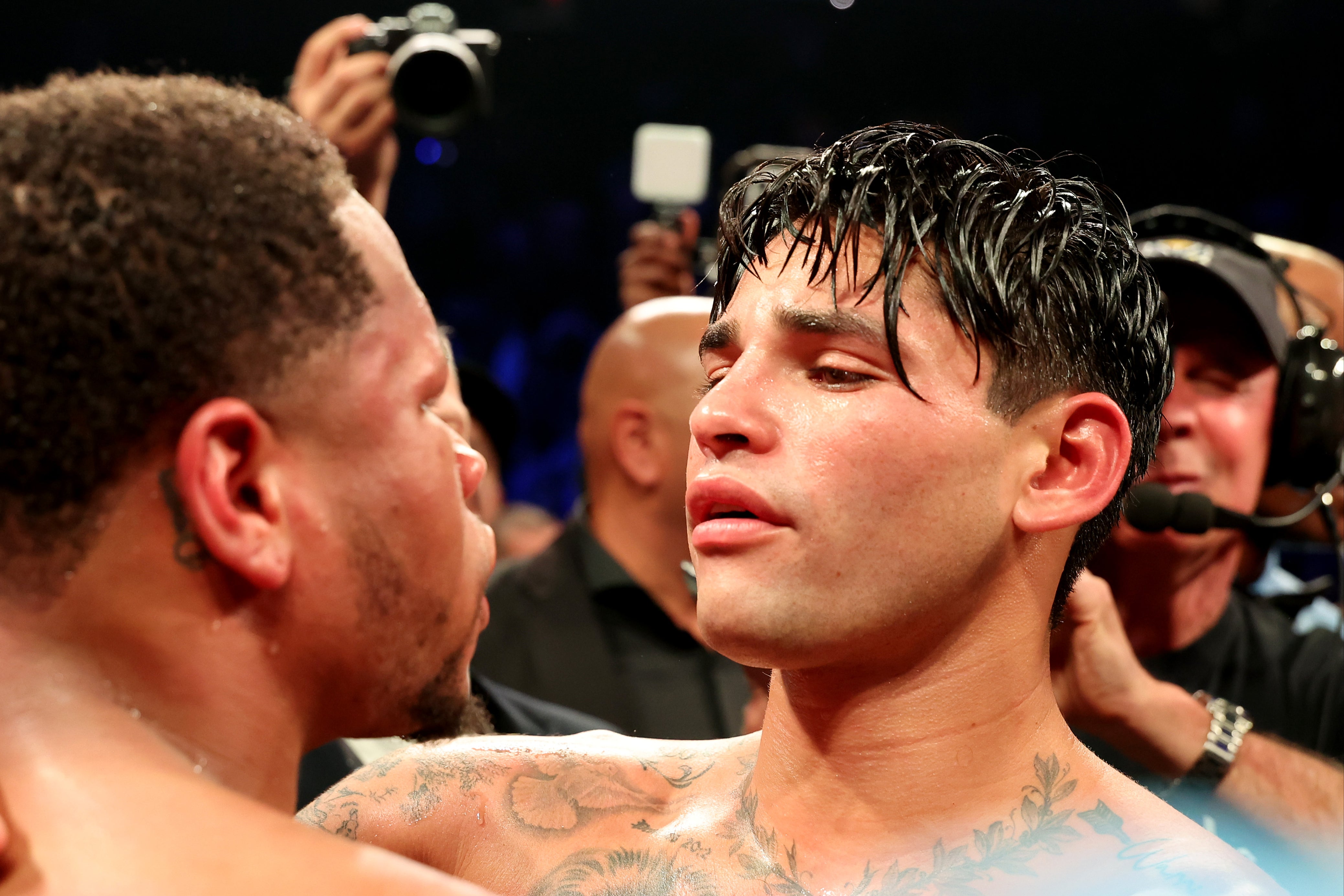 Ryan Garcia (right) beat Devin Haney on points in April