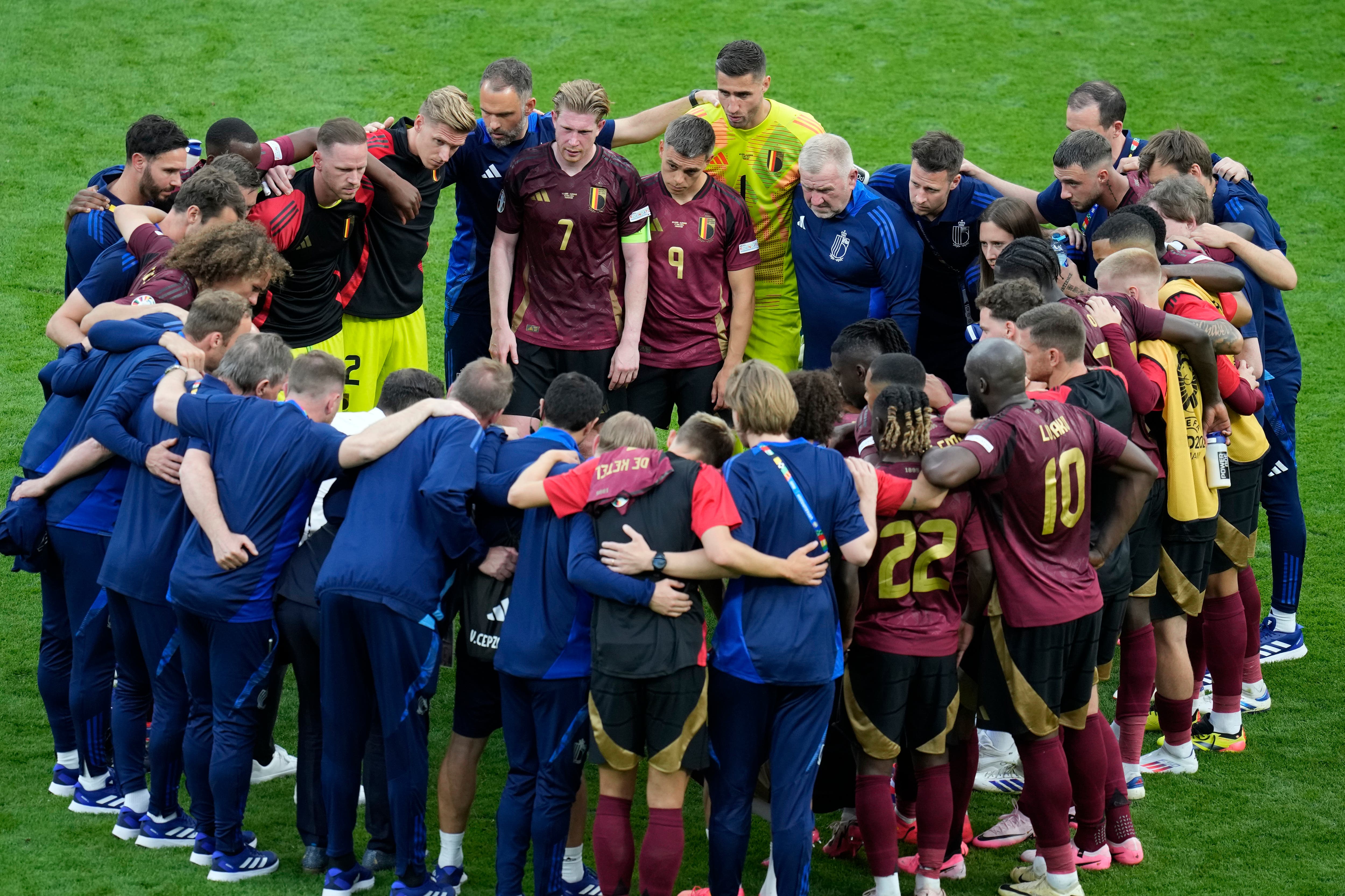 Belgium need a positive result against Romania to keep their chances of progressing alive (Themba Hadebe/AP)