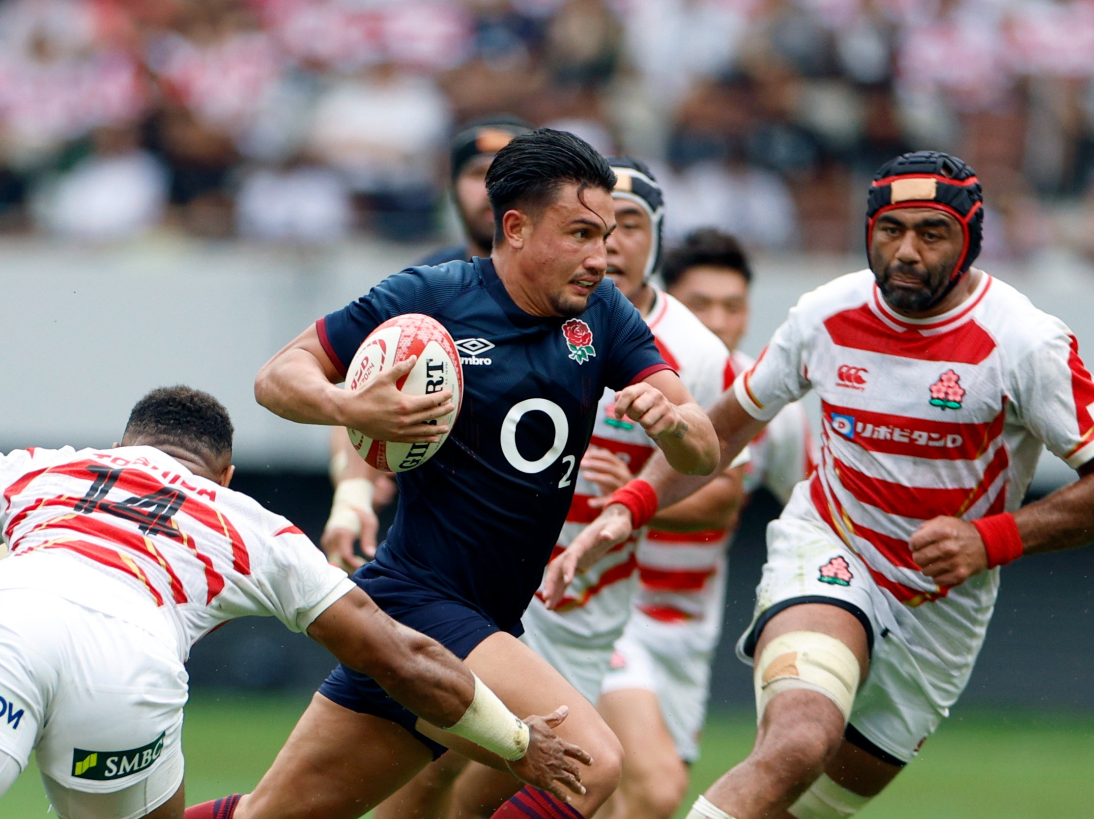 England fly-half Marcus Smith on his way to score a try against Japan at the National Stadium in Tokyo