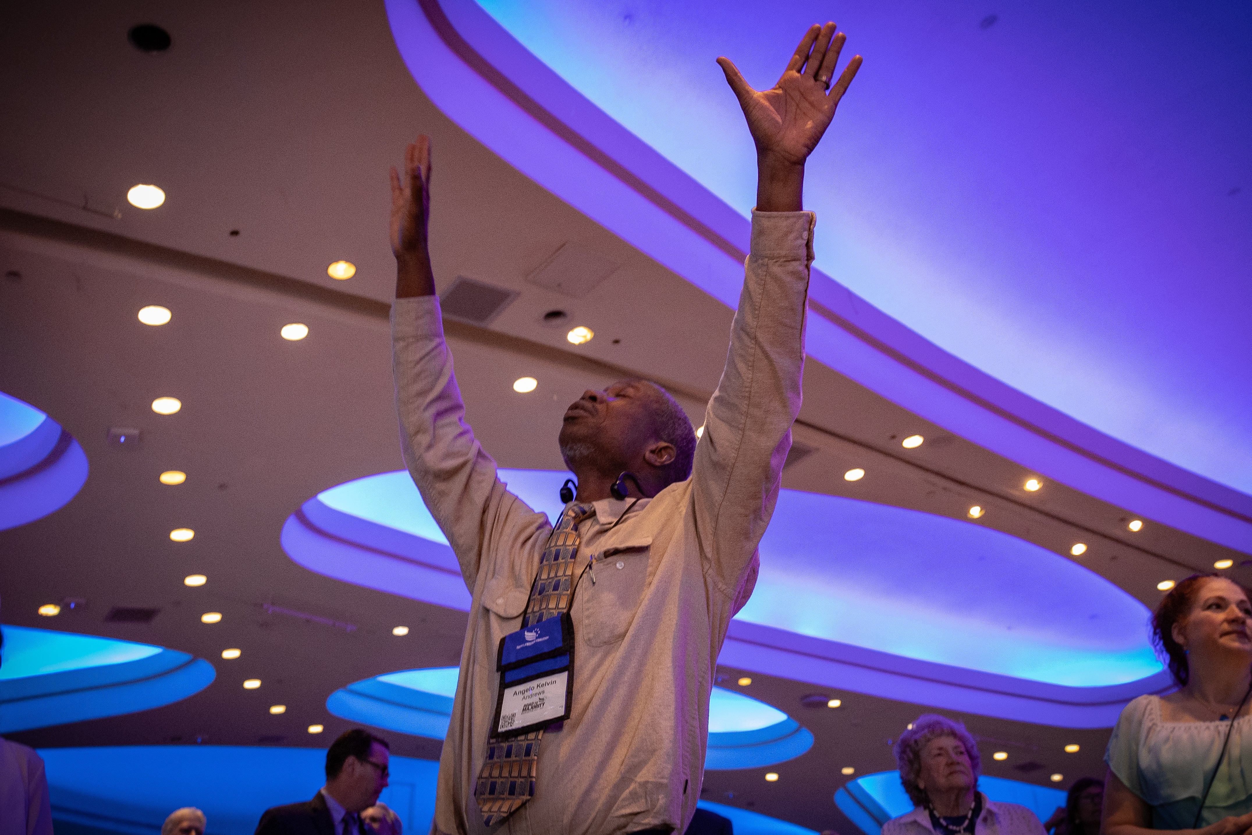 A delegate prays at the Road to Majority conference. Many evangelicals are expected to support Trump once again in November’s election