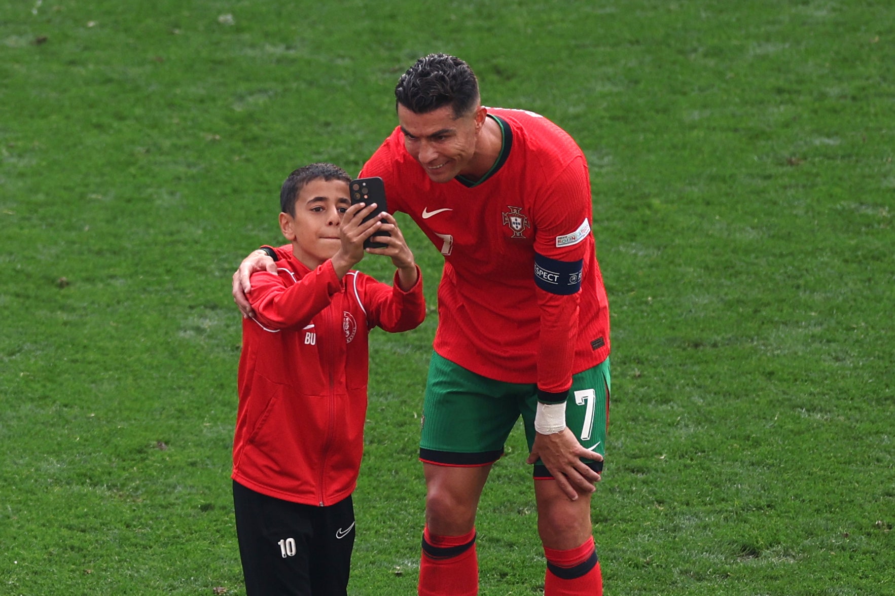 The young supporter was escorted away by security moments later