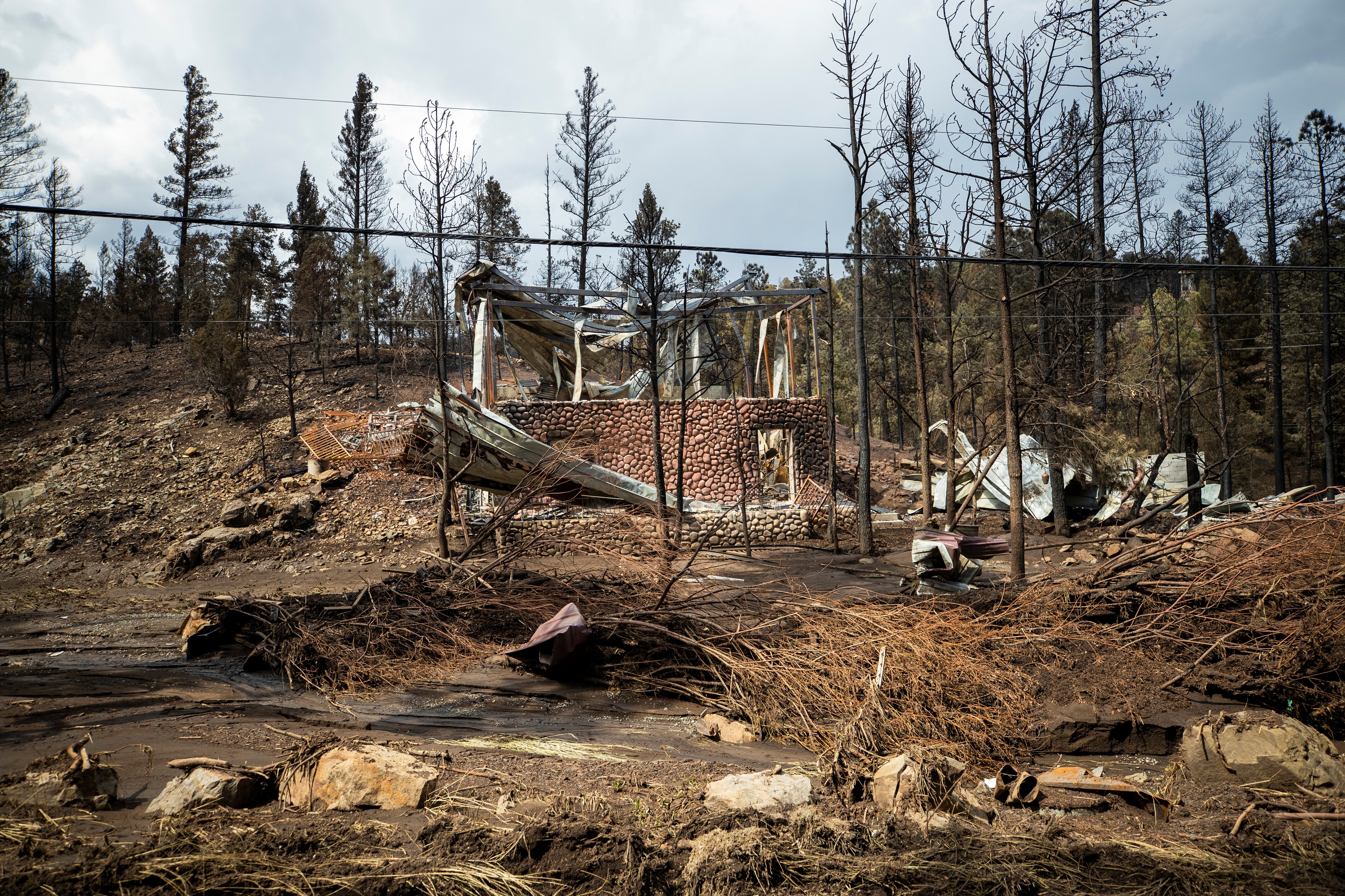 The remains of a house destroyed by the South Fork Fire