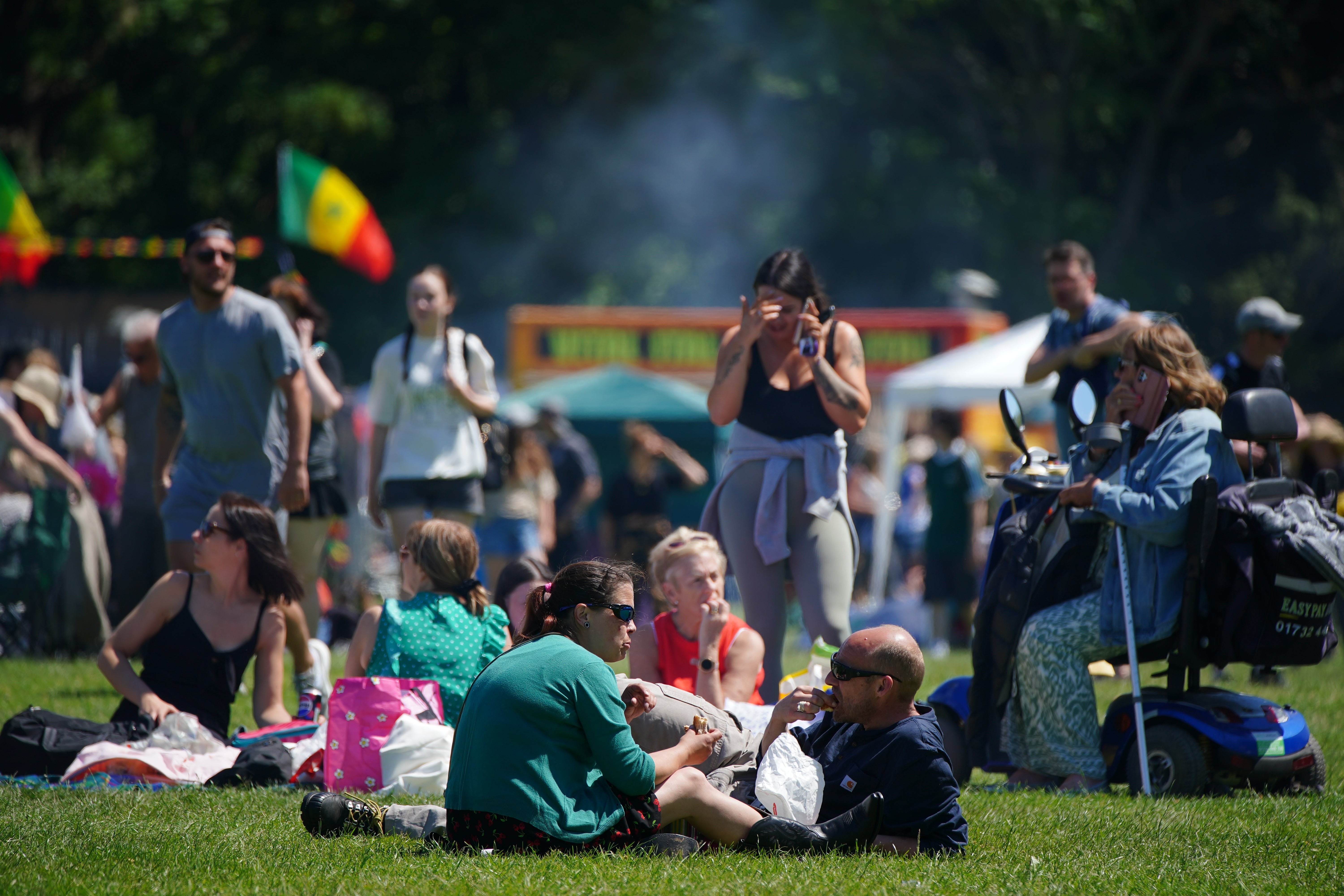 People at the Africa Oye festival in Sefton Park in Liverpool.