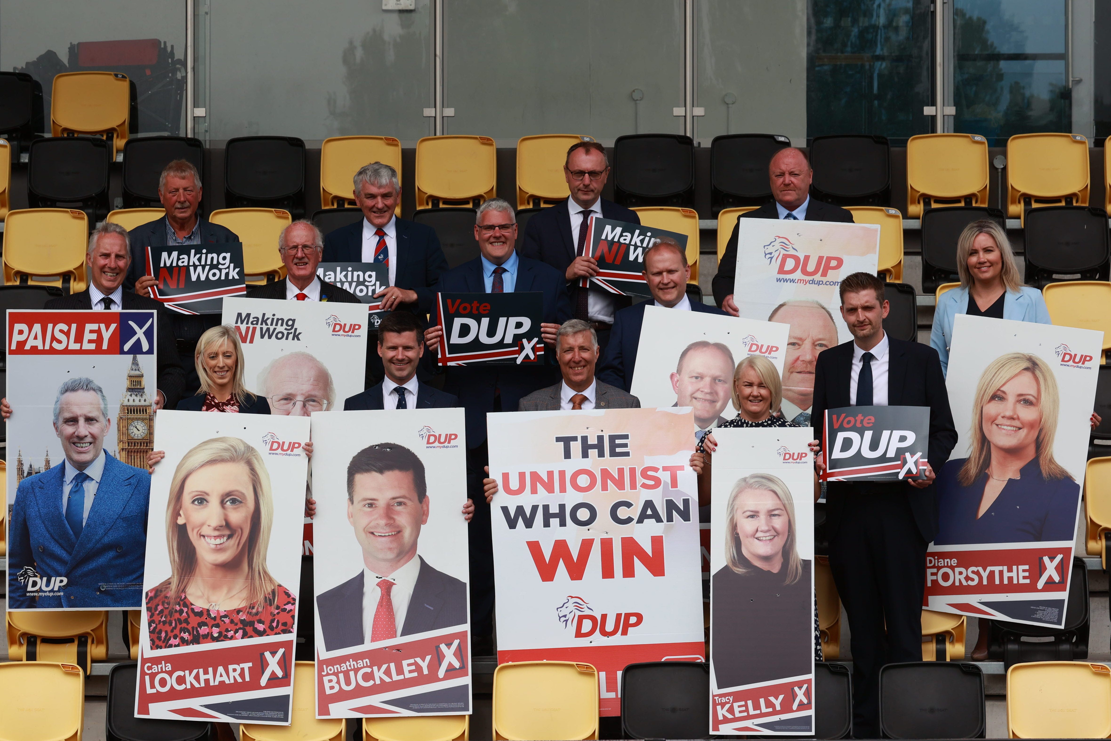 DUP leader Gavin Robinson (middle row, centre) with the party’s Westminster candidates at the manifesto launch (Liam McBurney/PA)