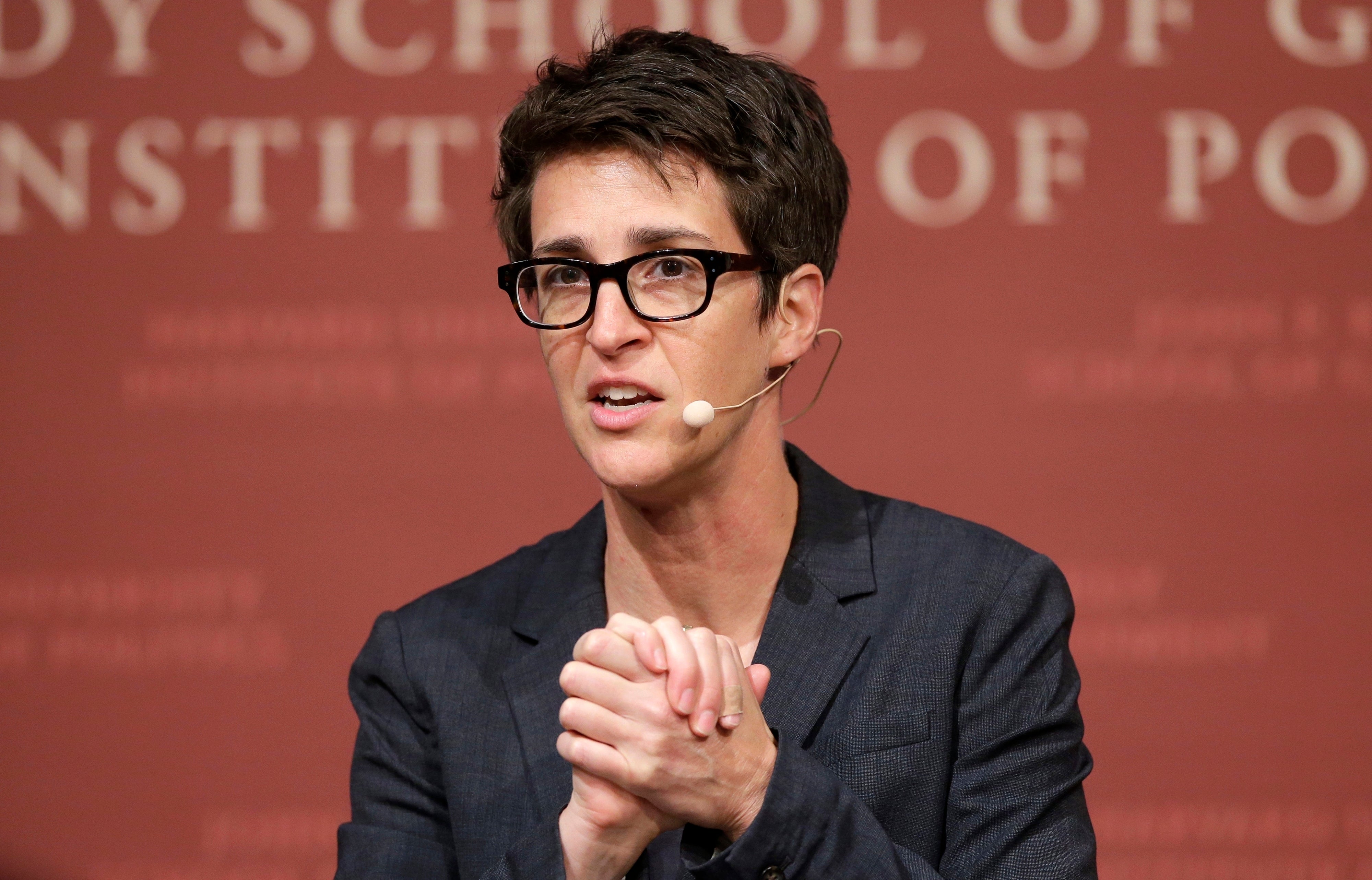 Rachel Maddow moderates a panel at a media event