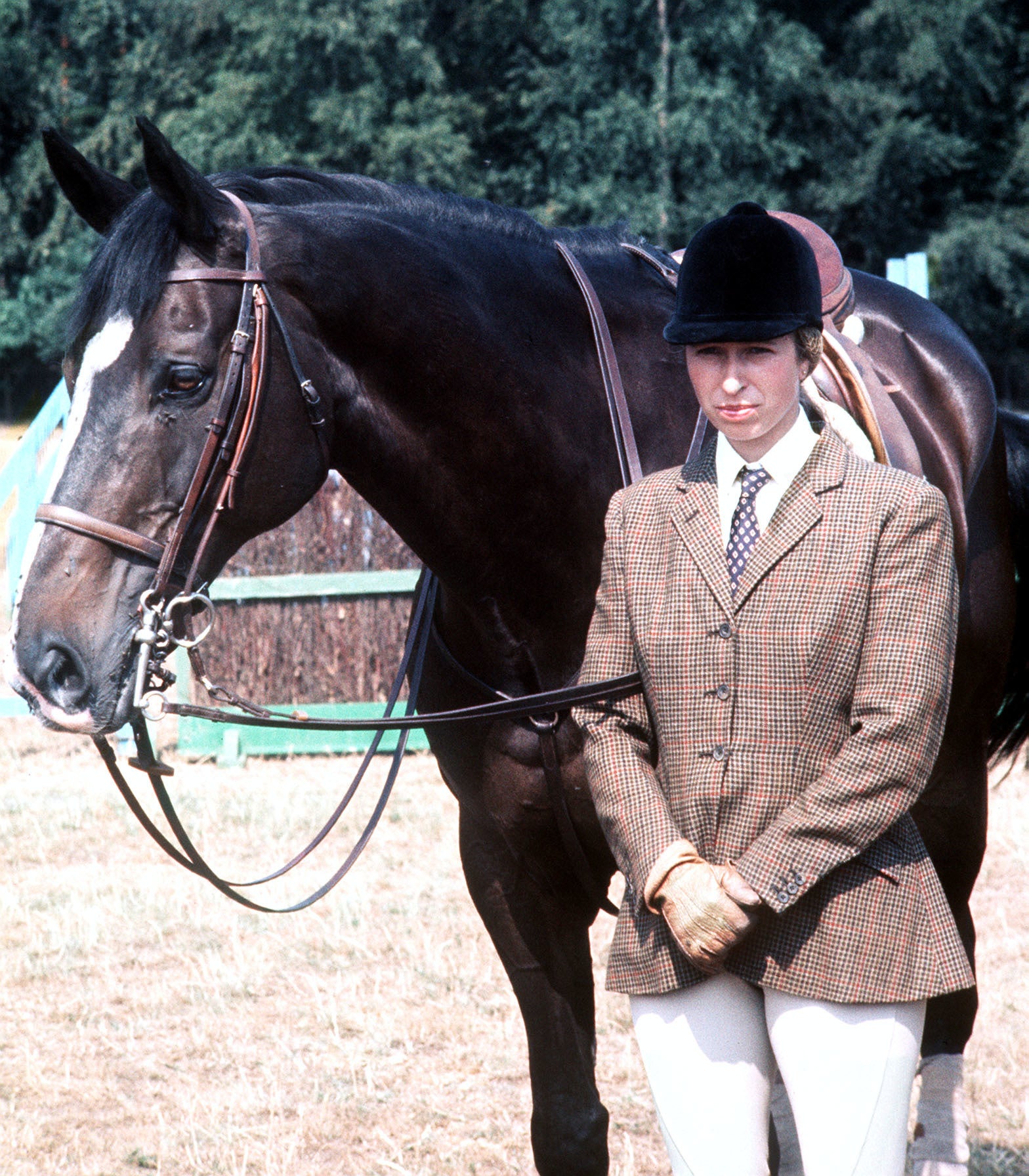 Princess Anne (later the Princess Royal) with the Queen’s horse, Goodwill, at Smith’s Lawn, Windsor, during a break in training with the British Olympic team for the three-day event at the Montreal Olympic Games in Canada.