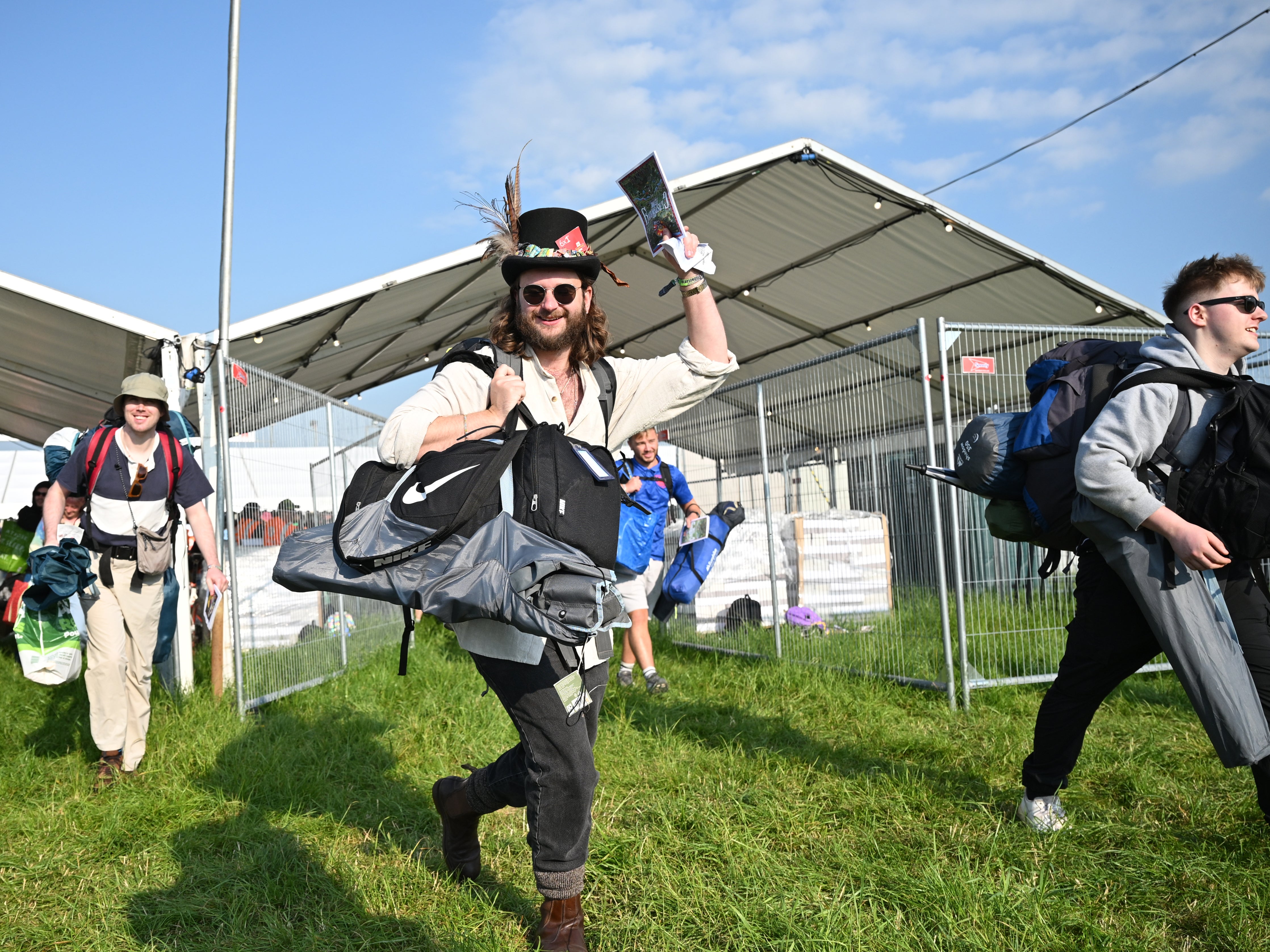 Revellers arrive at Glastonbury on Wednesday, but Labour staffers are banned