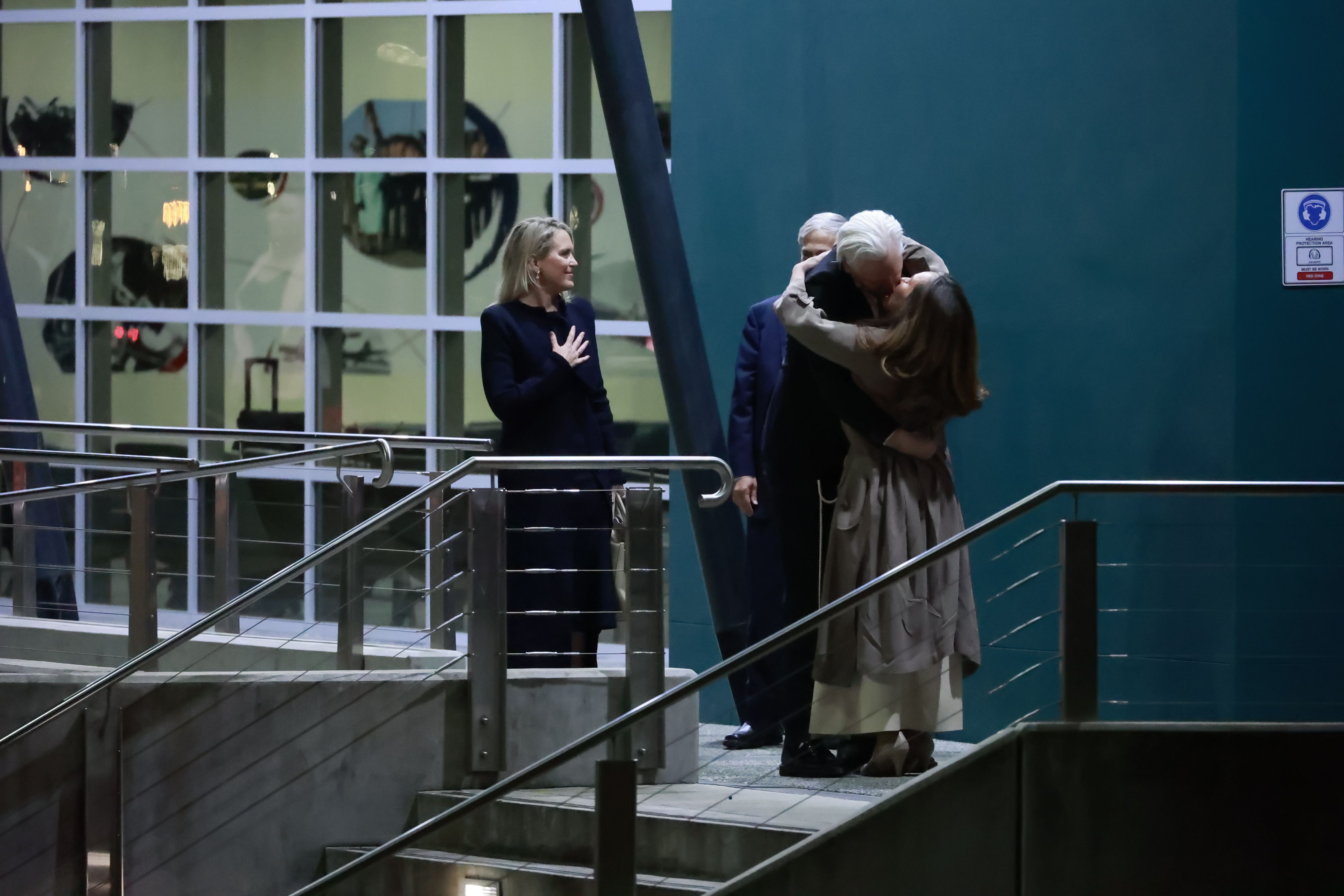 WikiLeaks founder Julian Assange embraces his wife Stella as he arrives in Canberra (Hilary Wardhaugh/PA)