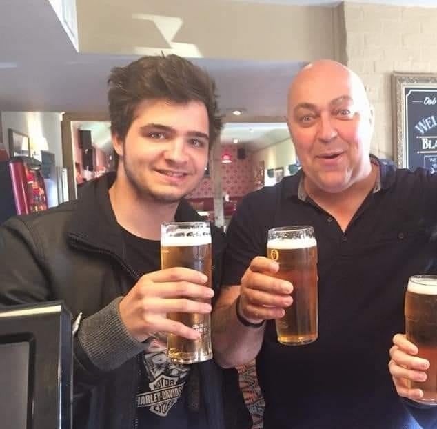 Mr Garland in happier times with his son Ben, taking him out for his first beer aged 18 in Trowbridge