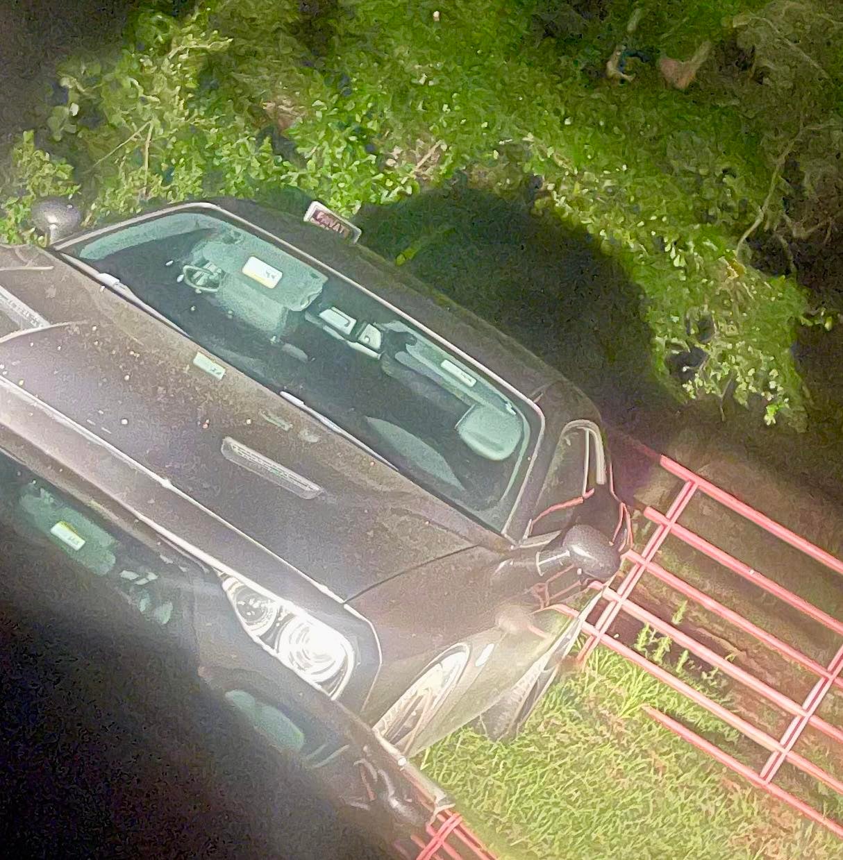 The Dodge Challenger that the suspects arrived in was captured on surveillance footage