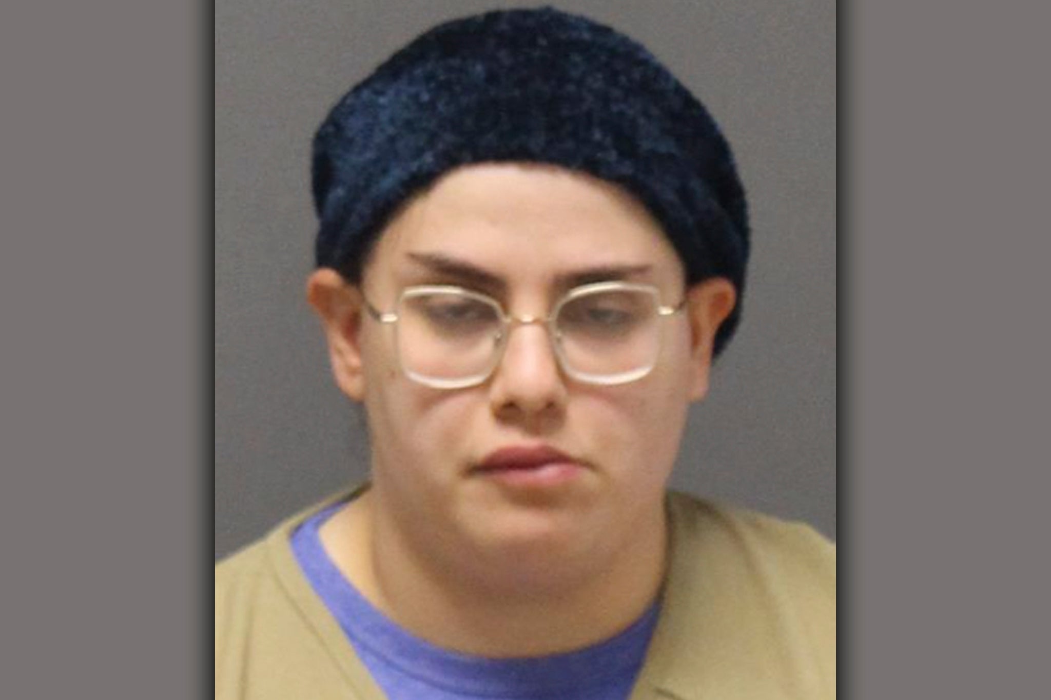 Naomi Elkins pictured in a booking photo. Police say the 27-year-old drowned her baby and toddler