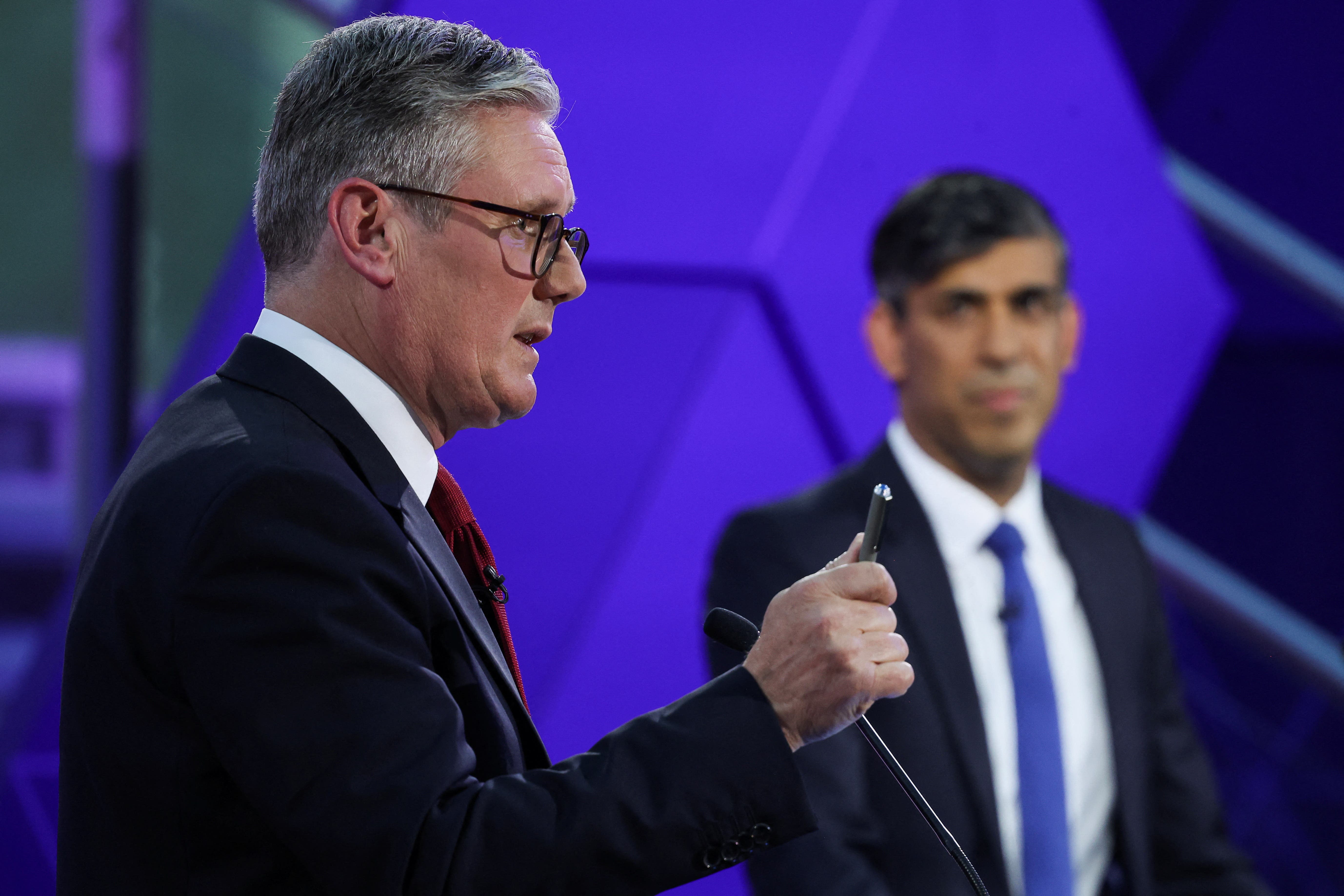 Sir Keir Starmer and Rishi Sunak argue during the final TV debate (Phil Noble/PA)