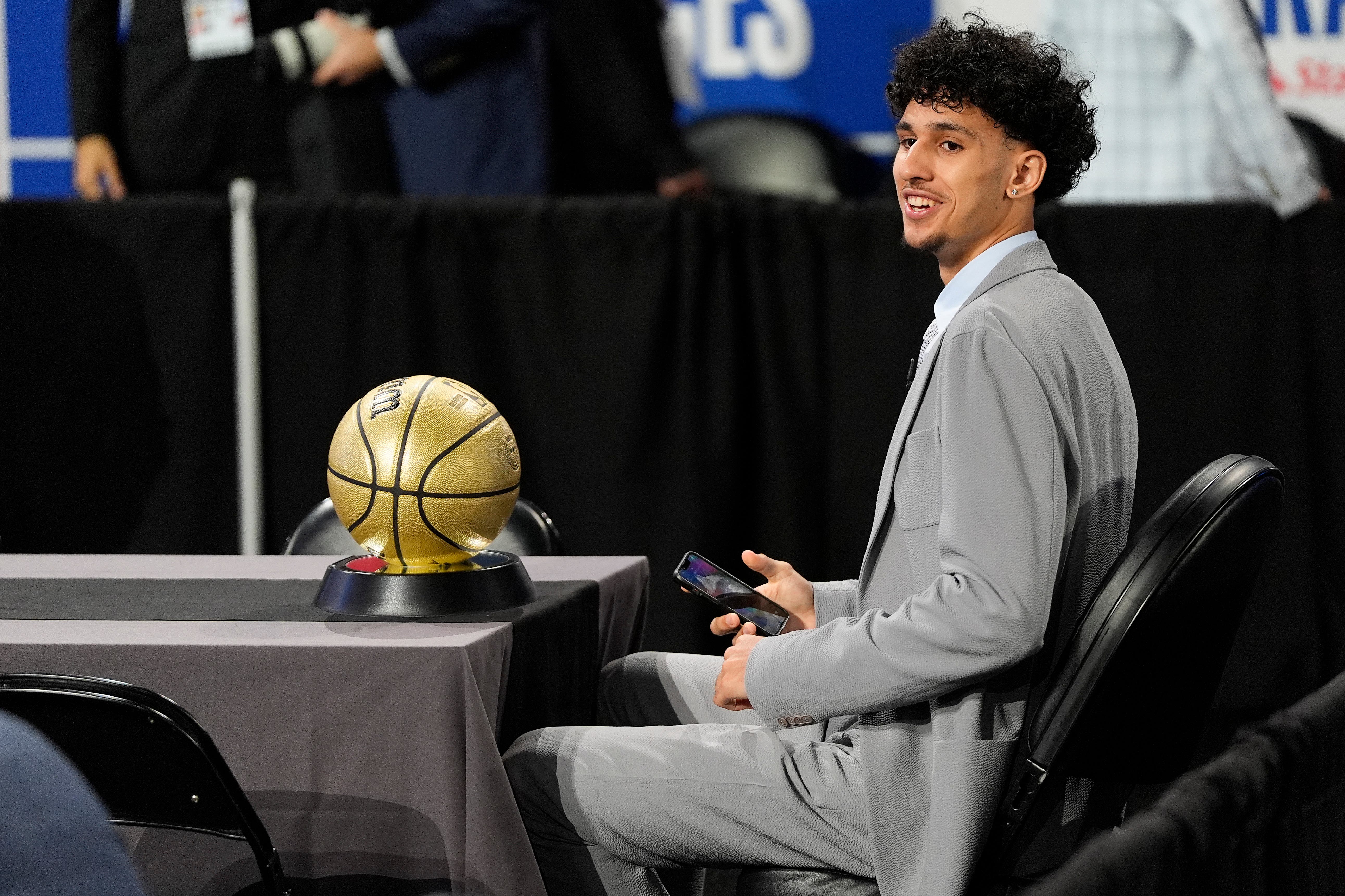 Zaccharie Risacher waits for the start of the NBA basketball draft (Julia Nikhinson/AP)