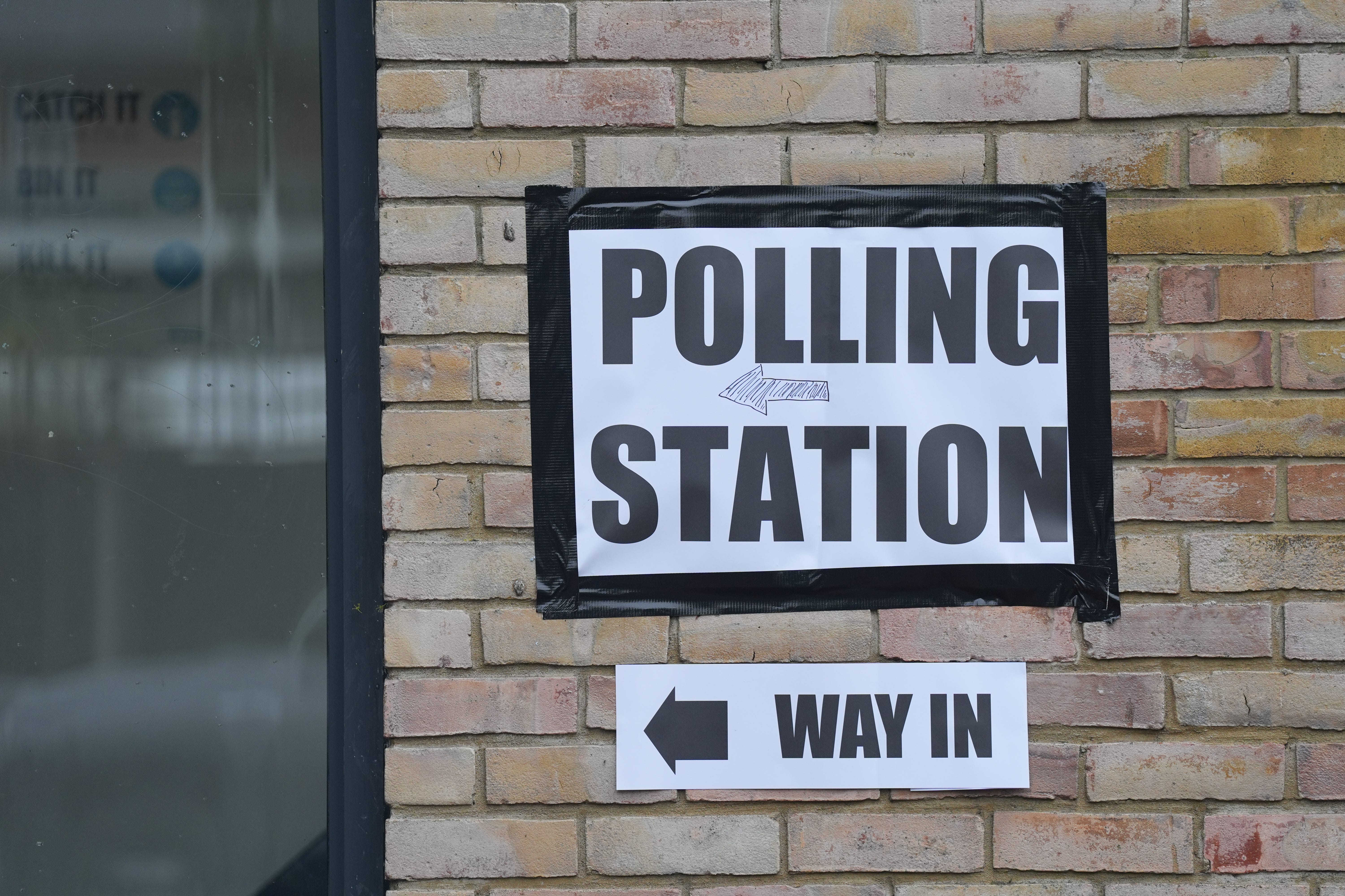 Voters are asked to complete a replica ballot as they leave the polling station (Yui Mok/PA