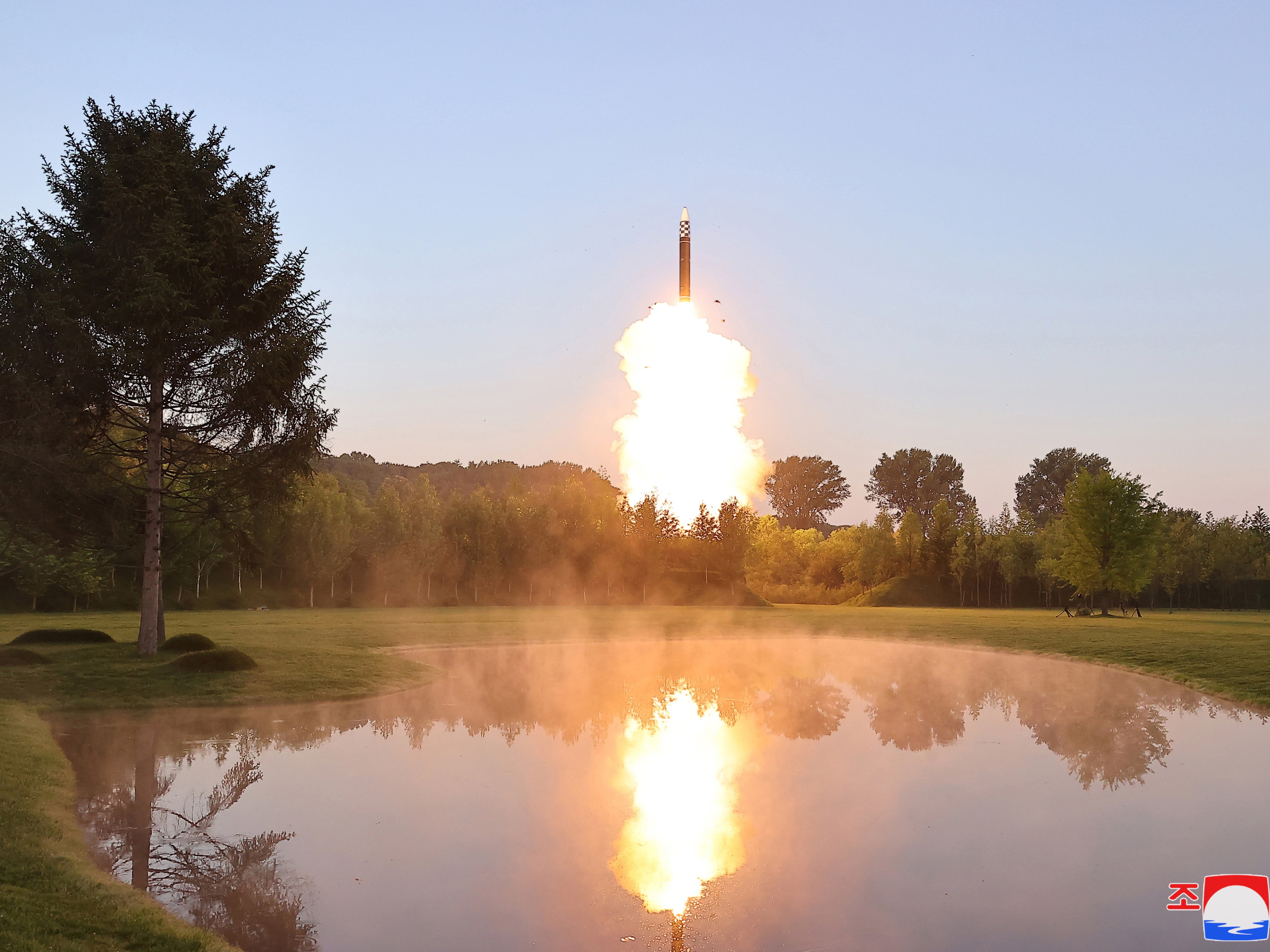 Photo released by the Korean Central News Agency shows an MIRV test conducted on 26 June 2024