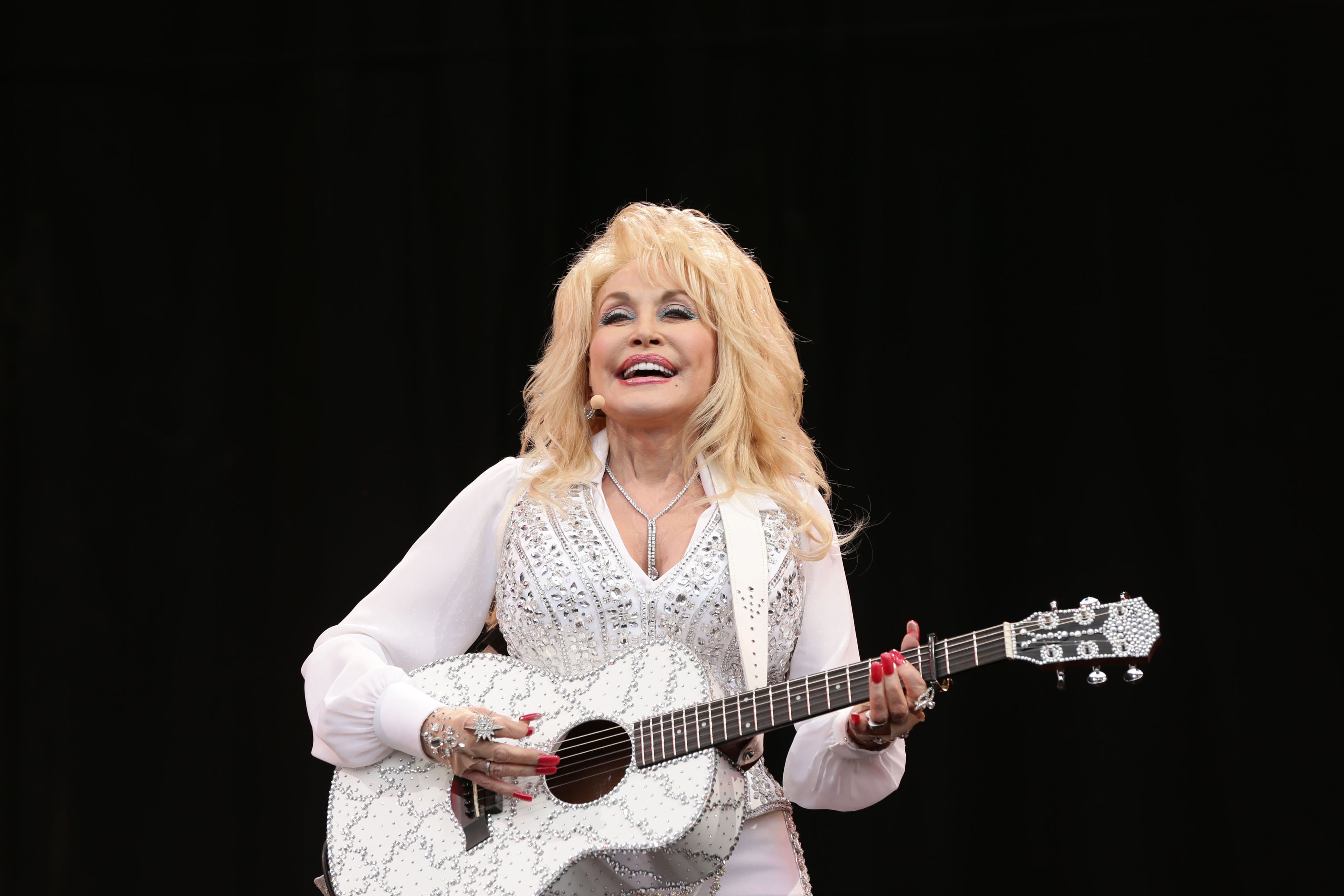 Dolly Parton has been sent a Wrexham AFC scarf by the football club’s owners Ryan Reynolds and Rob McElhenney (Yui Mok/PA)