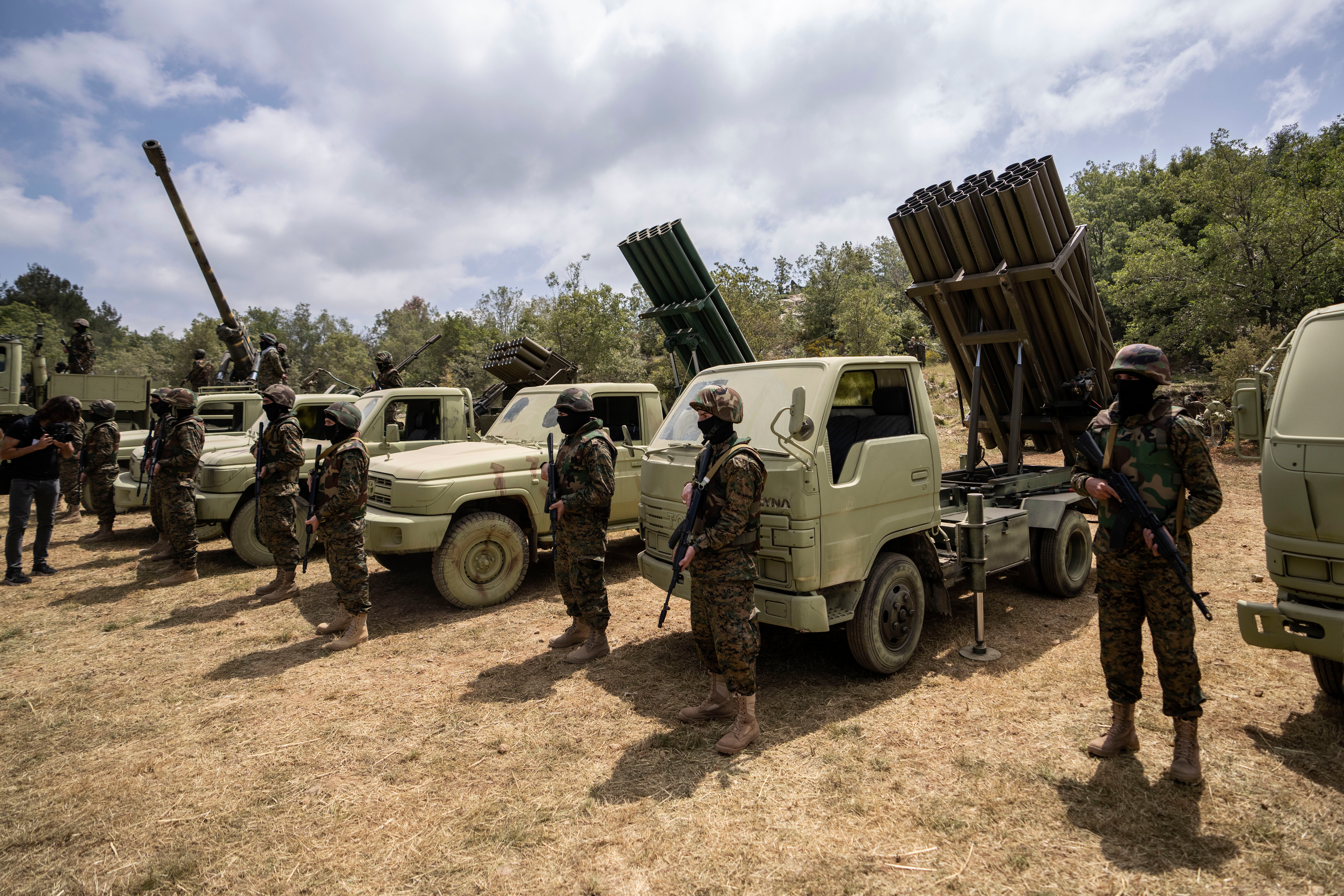 Fighters from the Lebanese militant group Hezbollah carry out a training exercise in Aaramta village in the Jezzine District, southern Lebanon