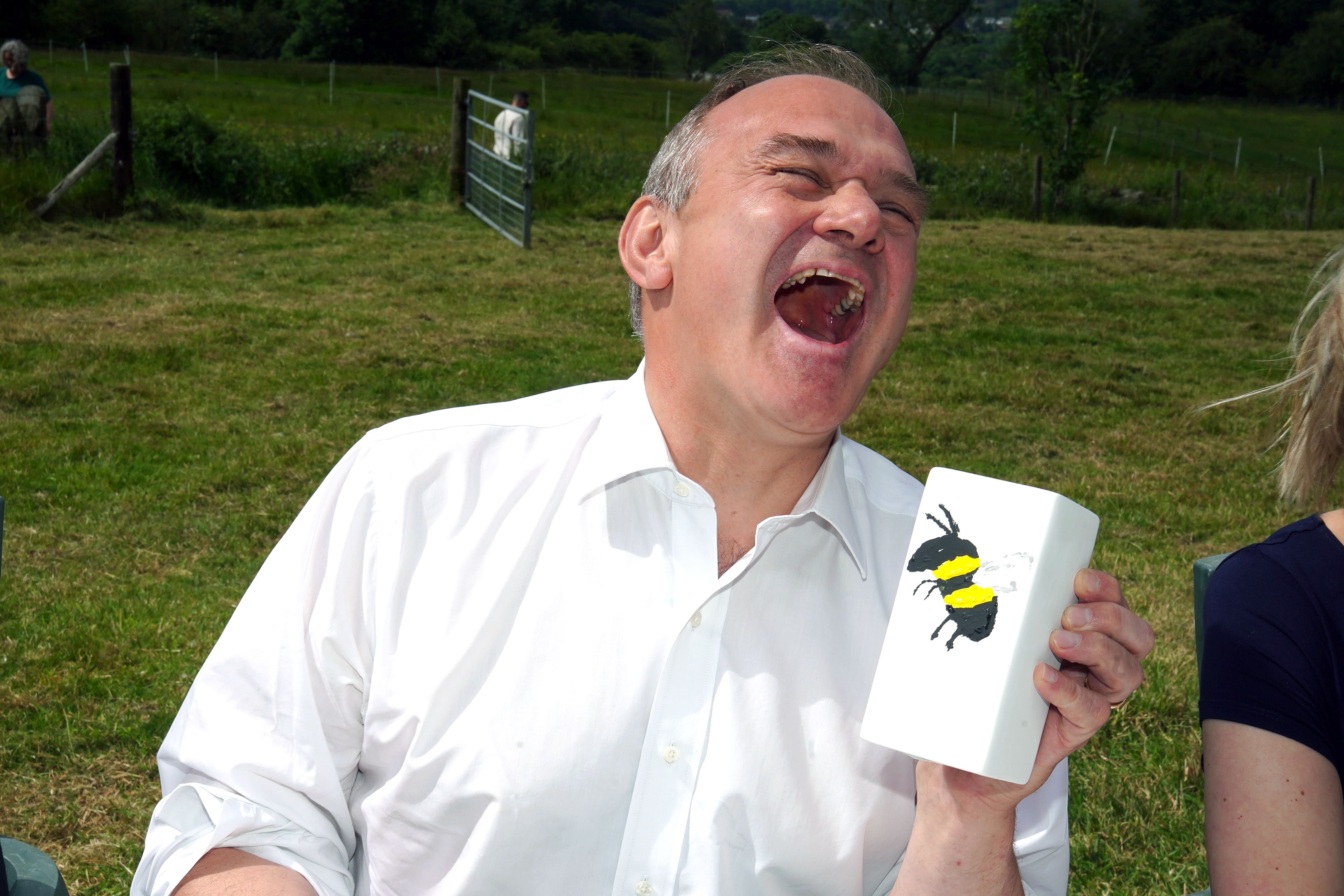 Liberal Democrat leader Sir Ed Davey painting pottery during a visit to Vale House, Marple Bridge in Greater Manchester (Peter Byrne/PA)