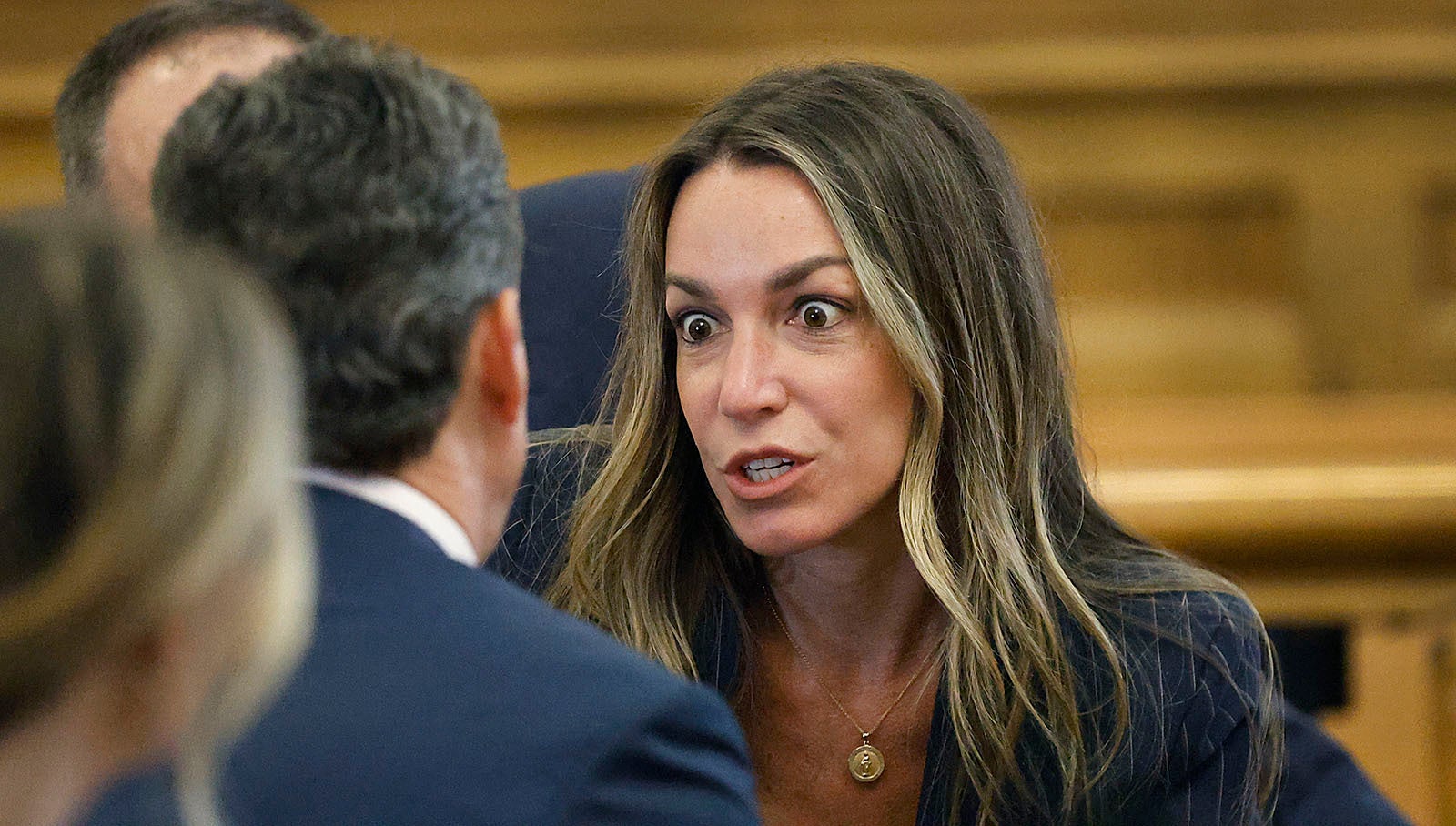 Karen Read talks to her attorney as the jury enters the courtroom during trial. A jury has said they can’t reach a verdict, but a judge sent them back to talk more