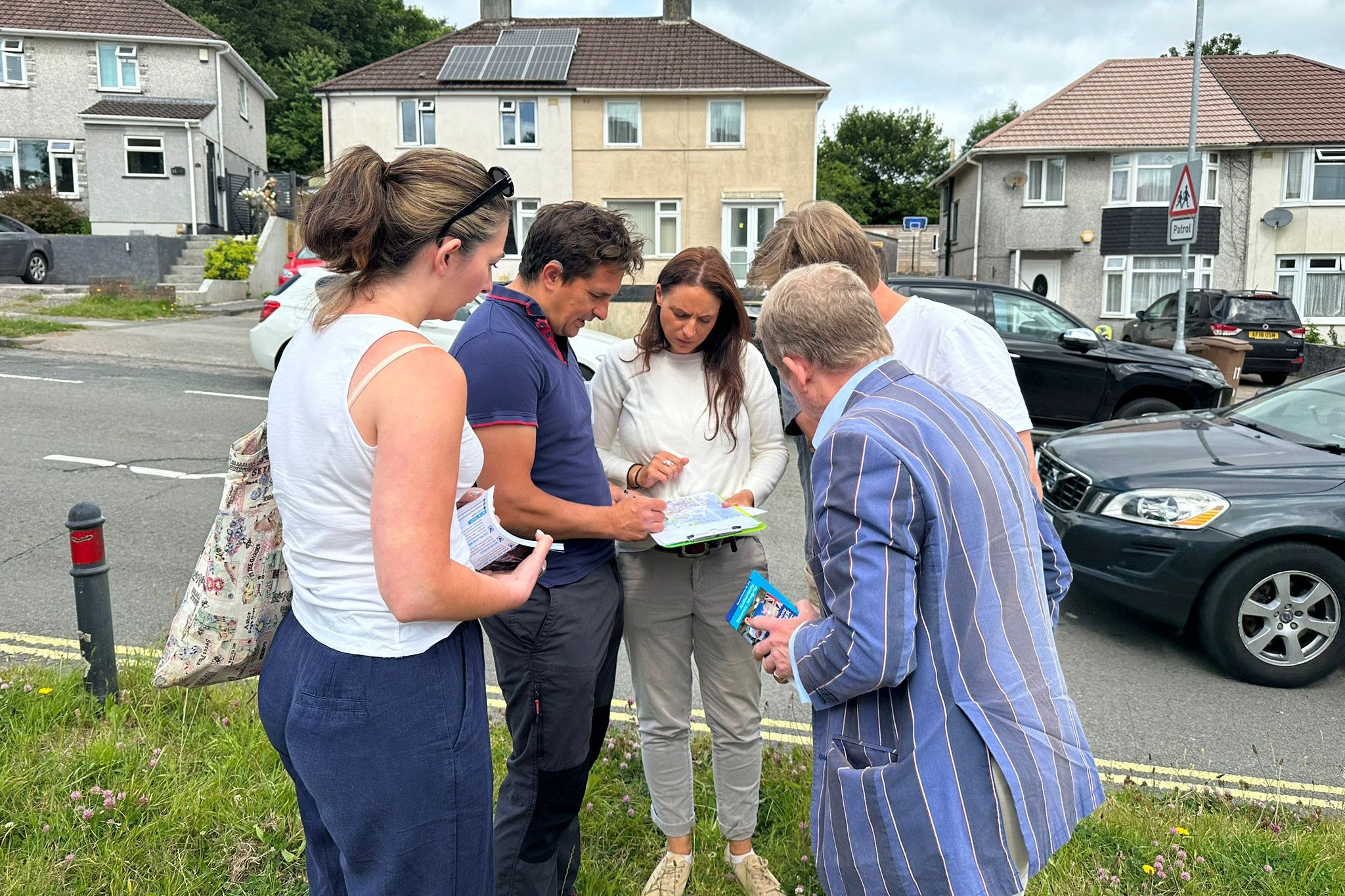 The day kicks off with Mr Mercer directing his team on door knocking duties