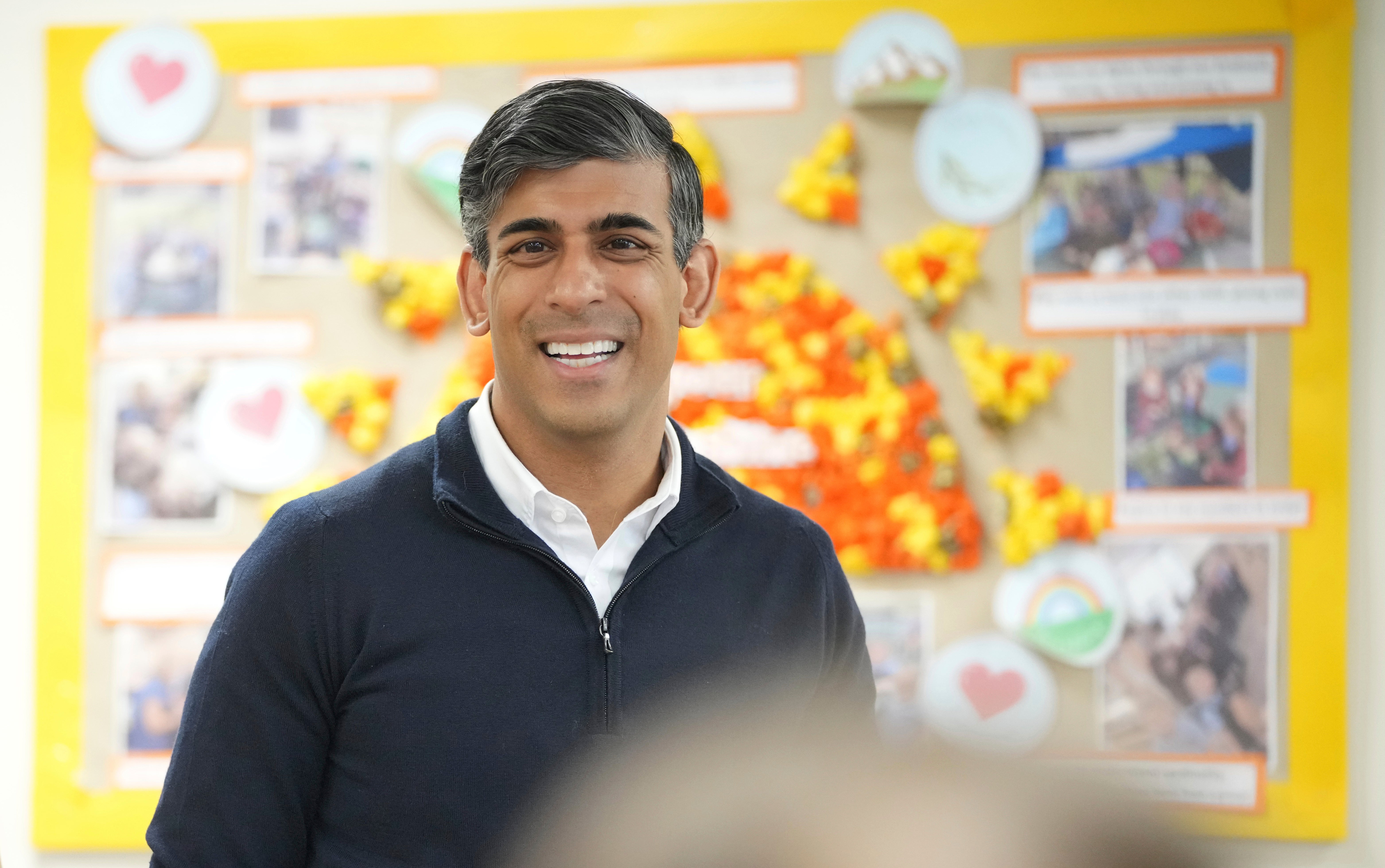 Mr Sunak inside a classroom at Holy Trinity Rosehill school