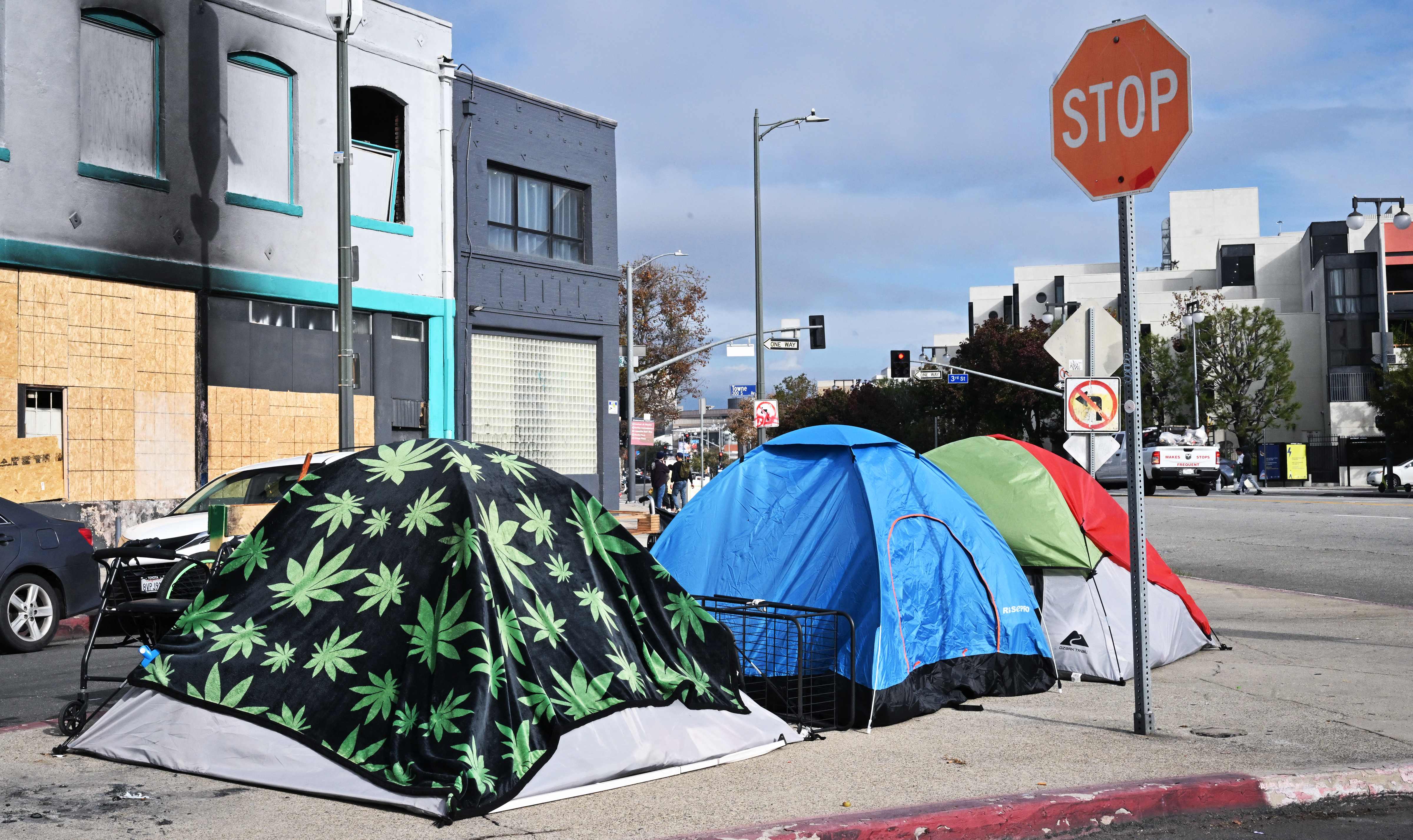 Tents for the homeless line a street corner in Los Angeles. On Thursday, Governor Gavin Newsom signed an order allowing state officials to remove encampments