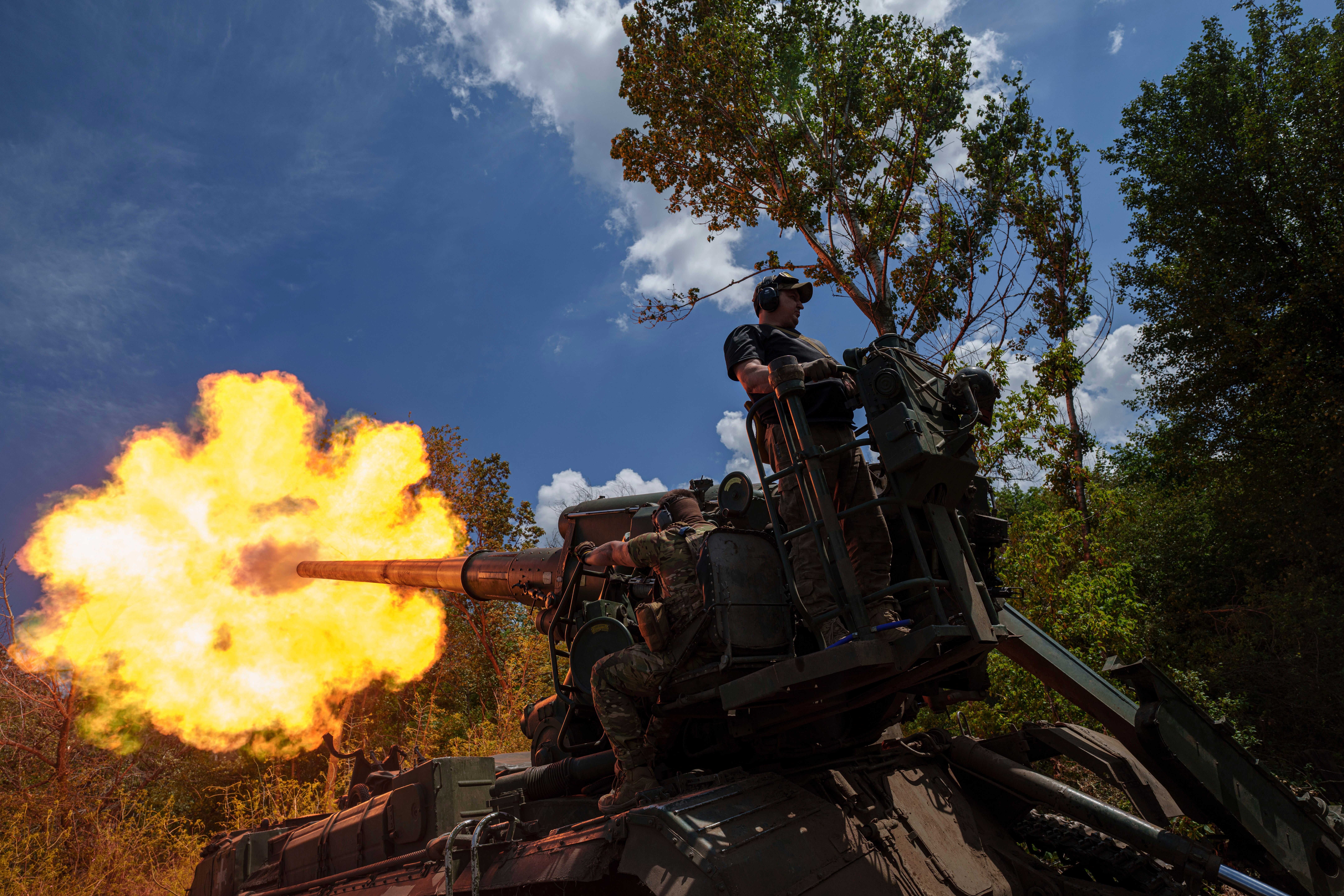 Ukrainian soldiers from the 43rd Artillery Brigade fire a self-propelled howitzer towards Russian positions, on the front line in the Donetsk region of Ukraine