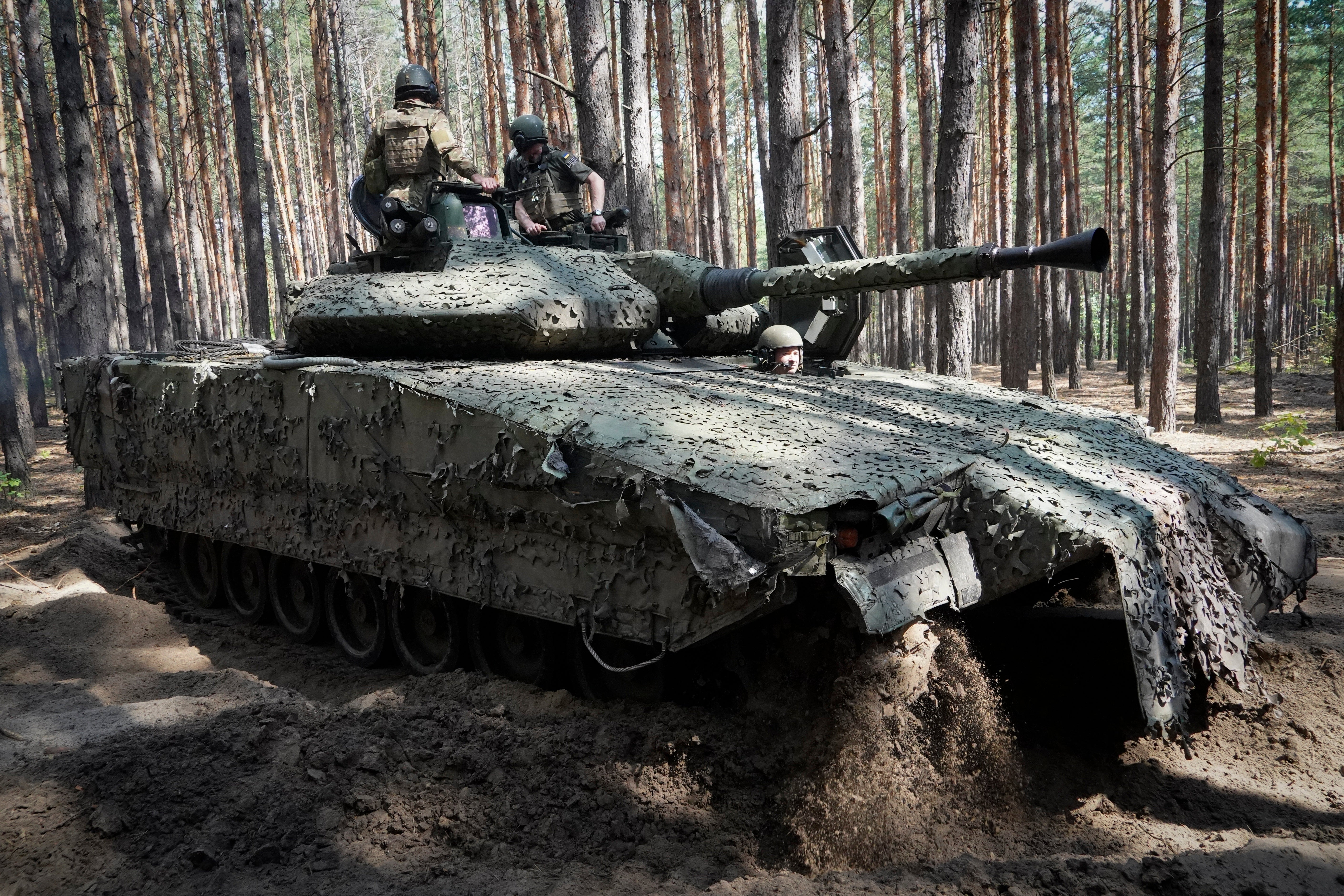 Ukrainian soldiers near the front line in the Kharkiv region of Ukraine