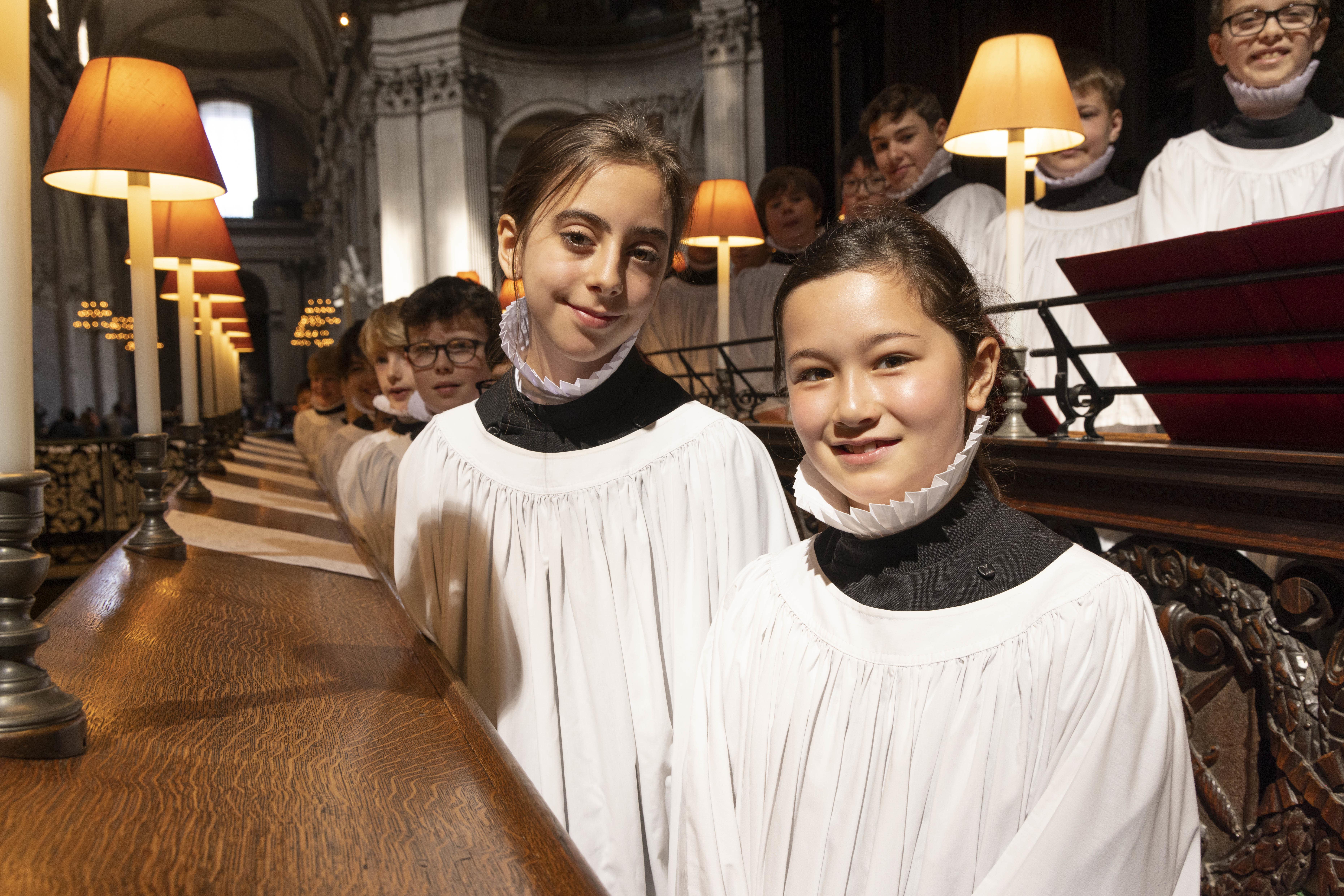 Choristers Lila, 11 and Lois (right), 10, at St Paul’s Cathedral in London, as for the first time girl choristers will formally join the St Paul’s Cathedral Choir as full choristers (Tim Anderson/PA)