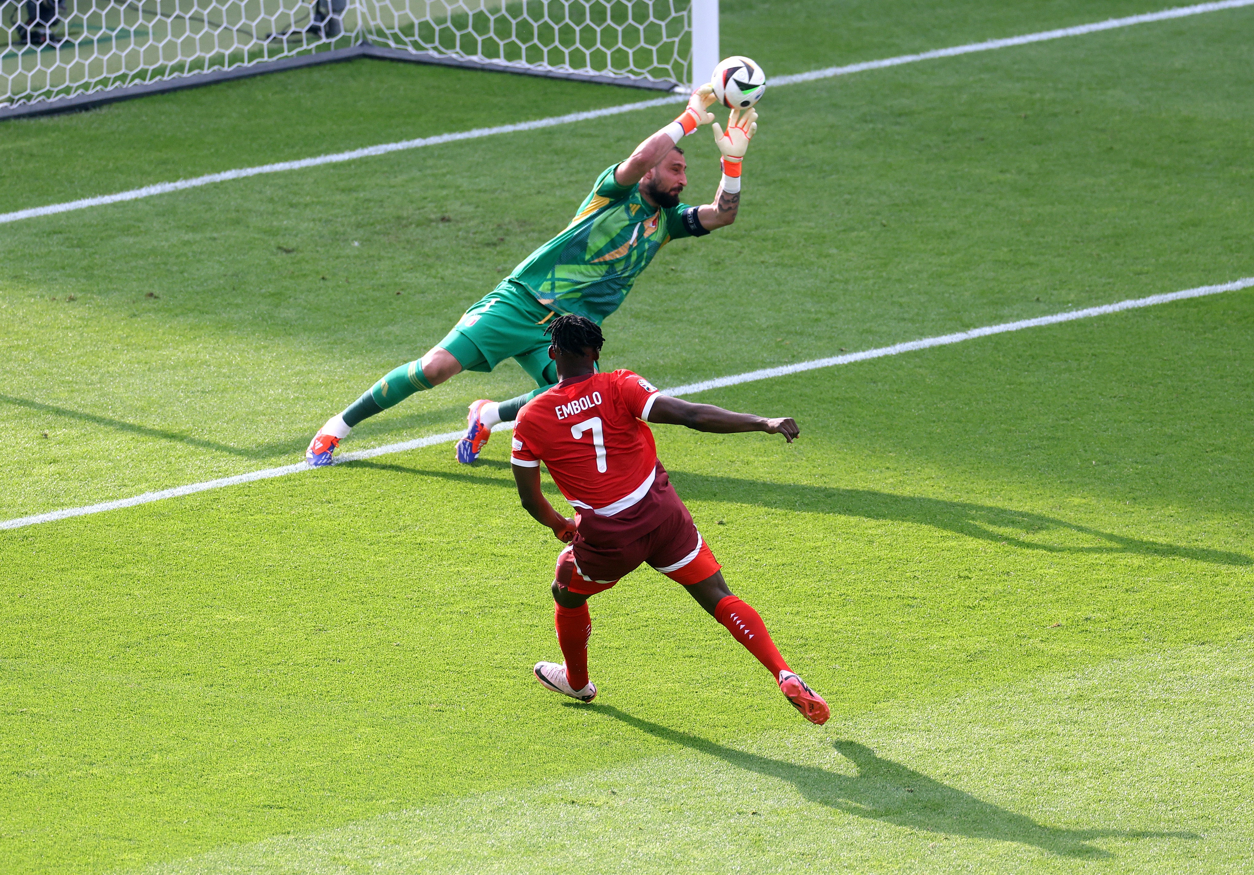 Breel Embolo sees his shot well saved by Gianluigi Donnarumma