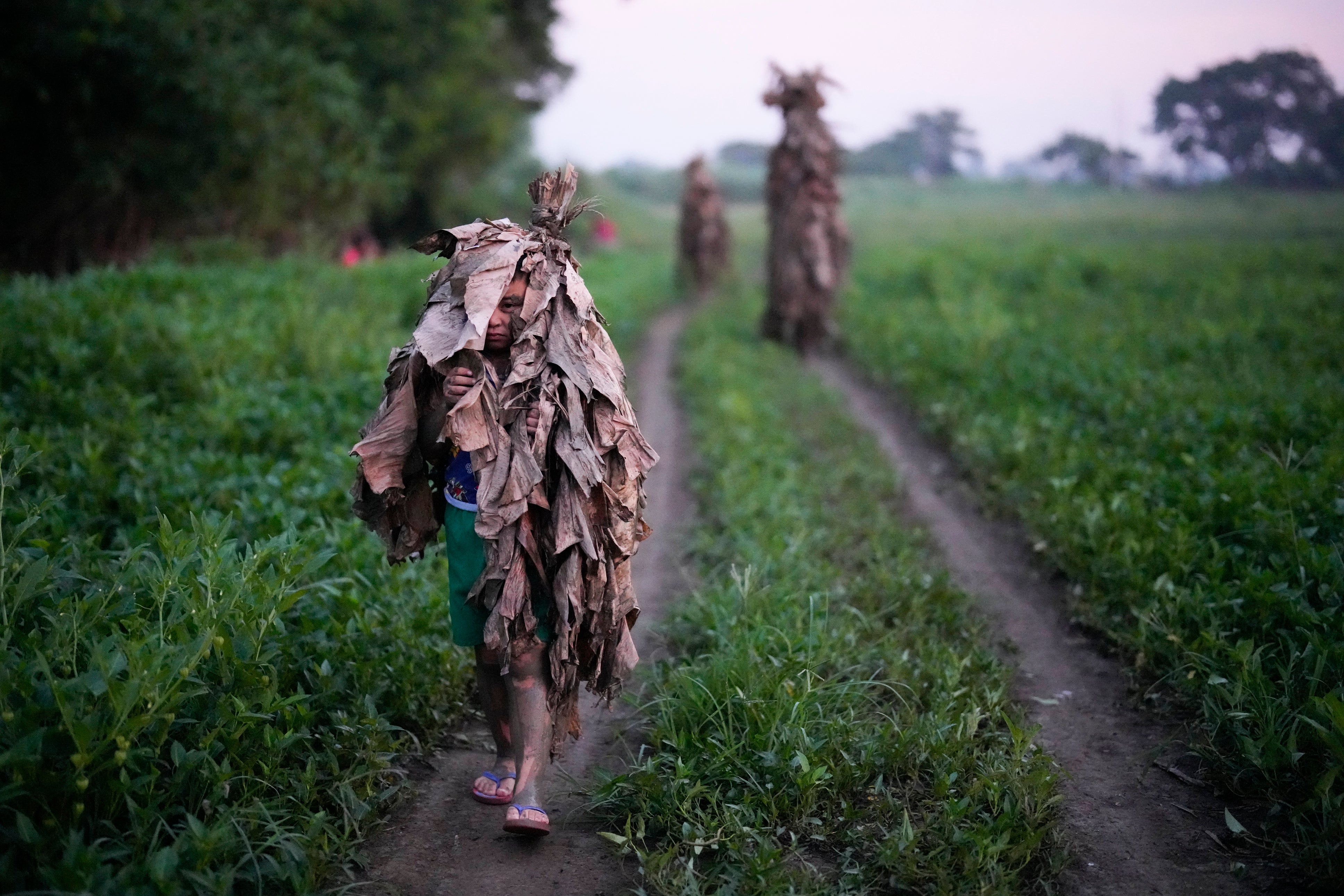 APTOPIX Philippines Mud People Photo Gallery