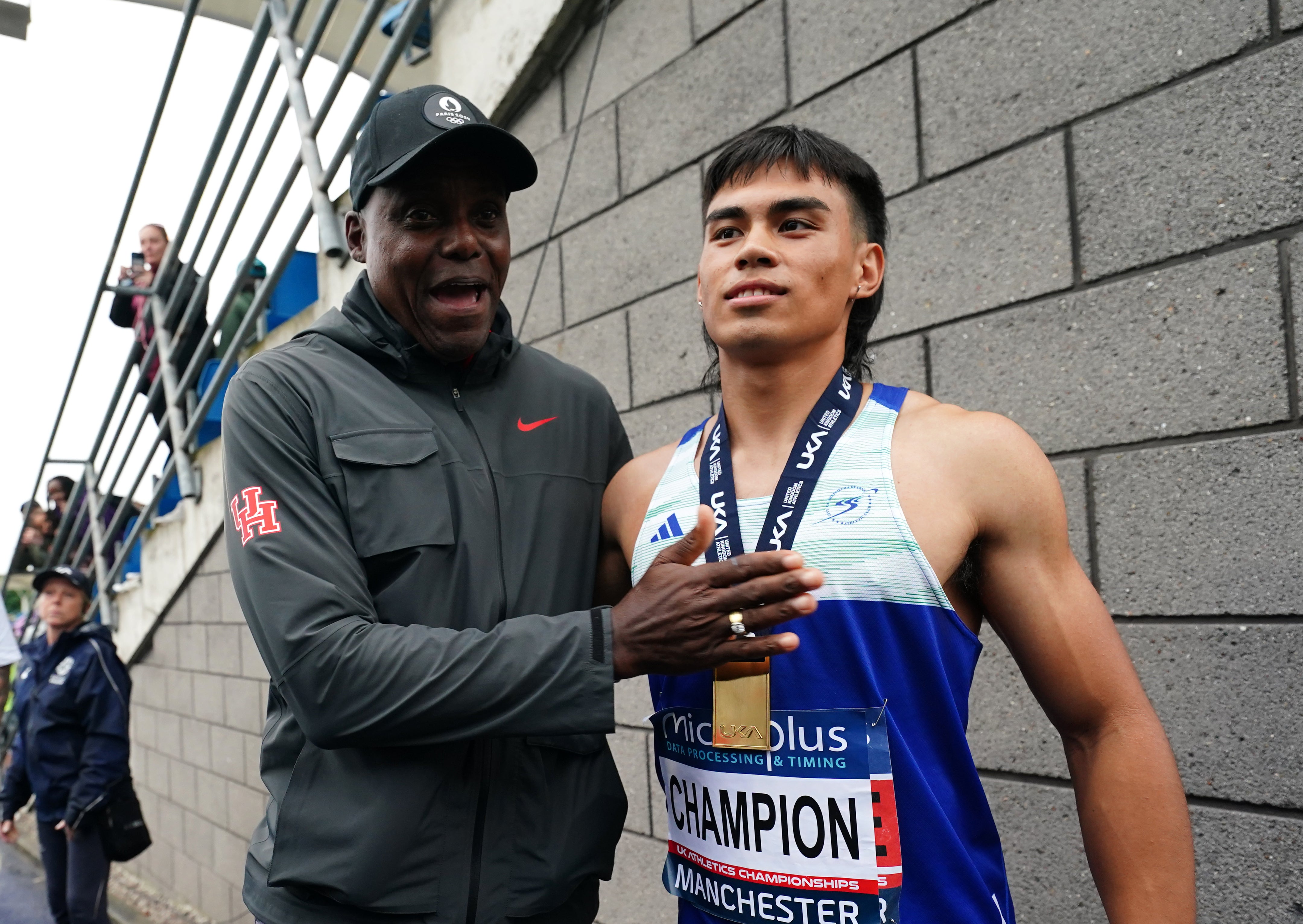 Louie Hinchliffe with his coach Carl Lewis (David Davies/PA).