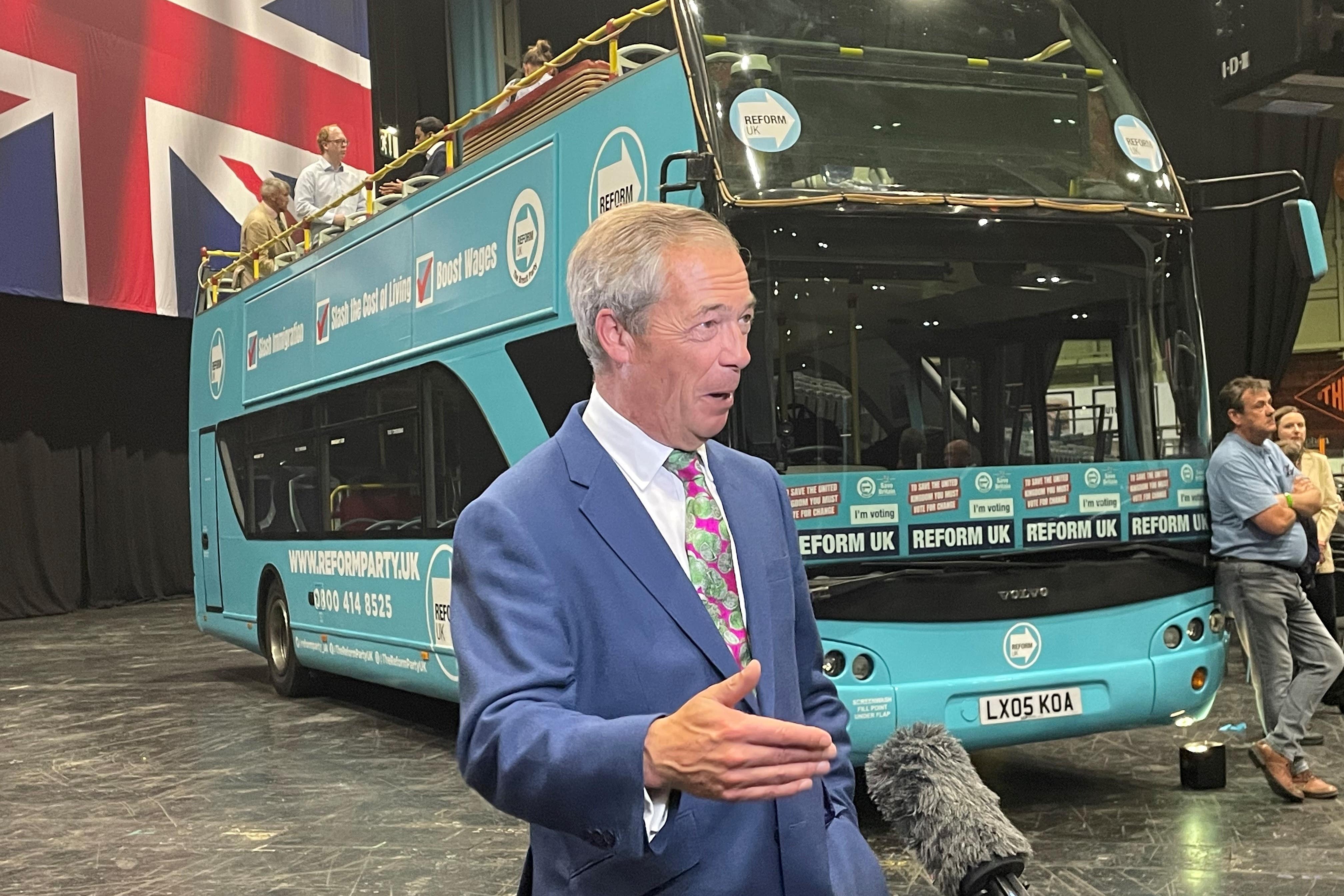 Reform UK leader Nigel Farage speaking to the media after the Reform UK rally (Matthew Cooper/PA)