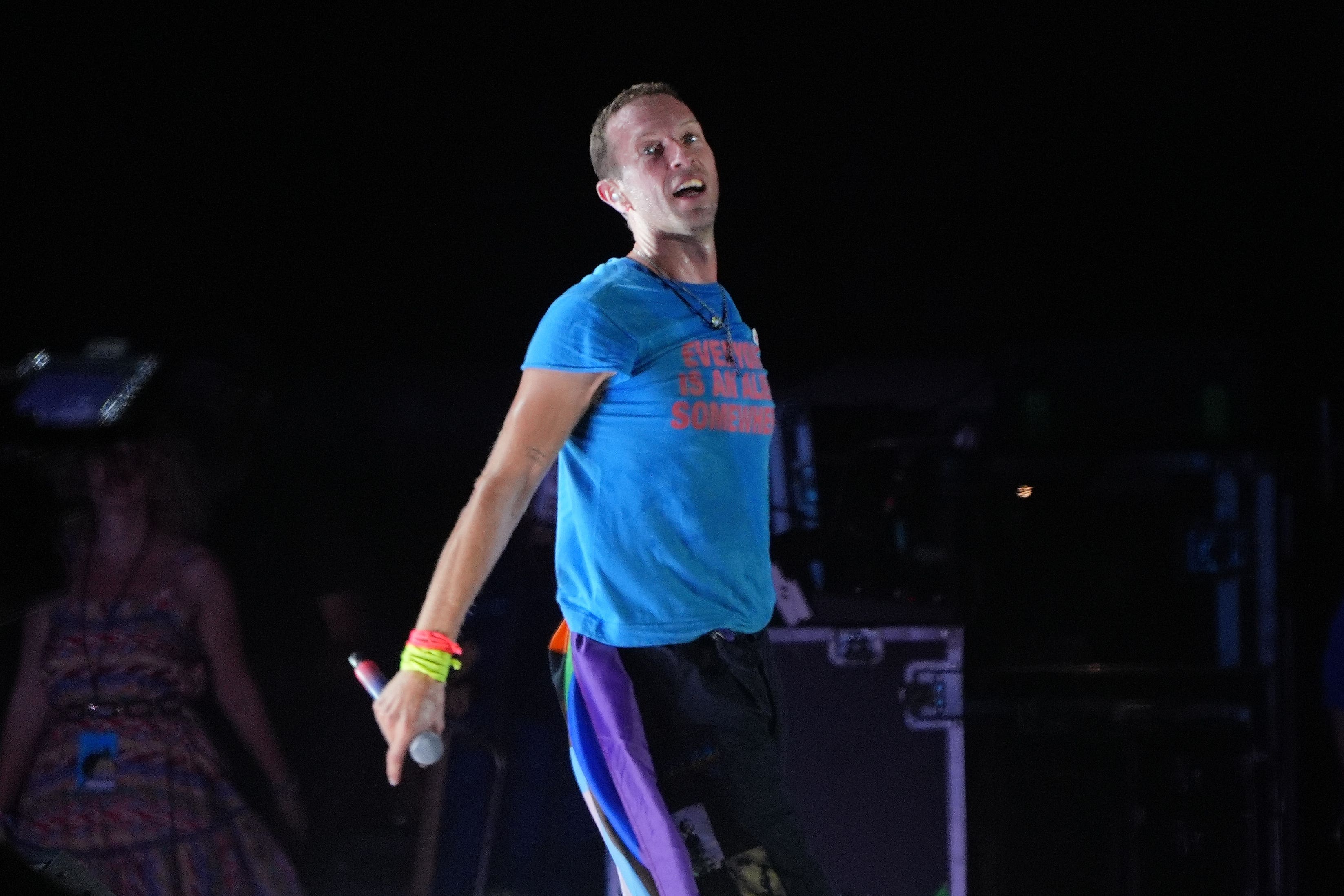 Chris Martin of Coldplay performing on the Pyramid Stage at the Glastonbury Festival