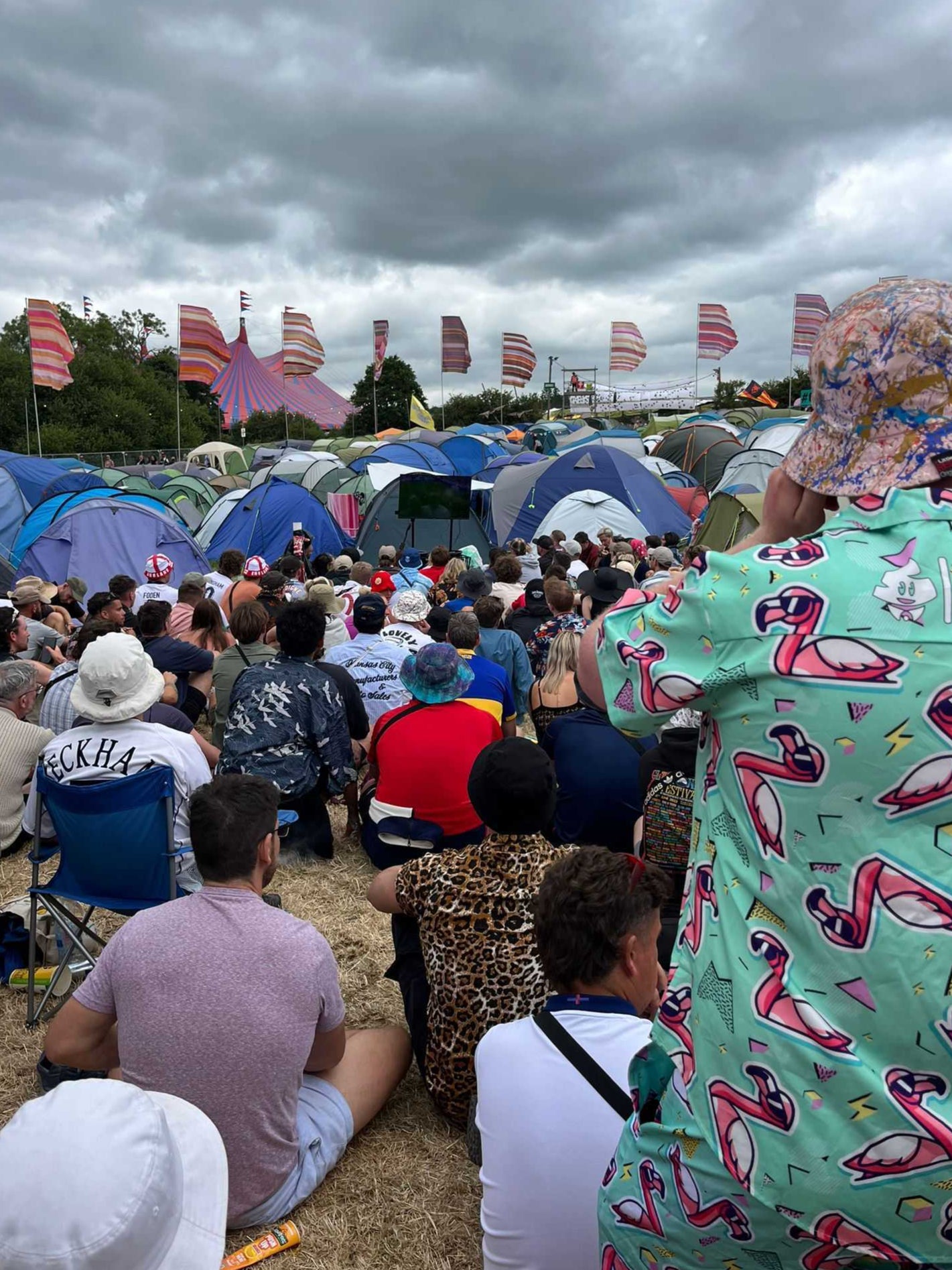 Glastonbury festival-goers tune into the England v Slovakia game