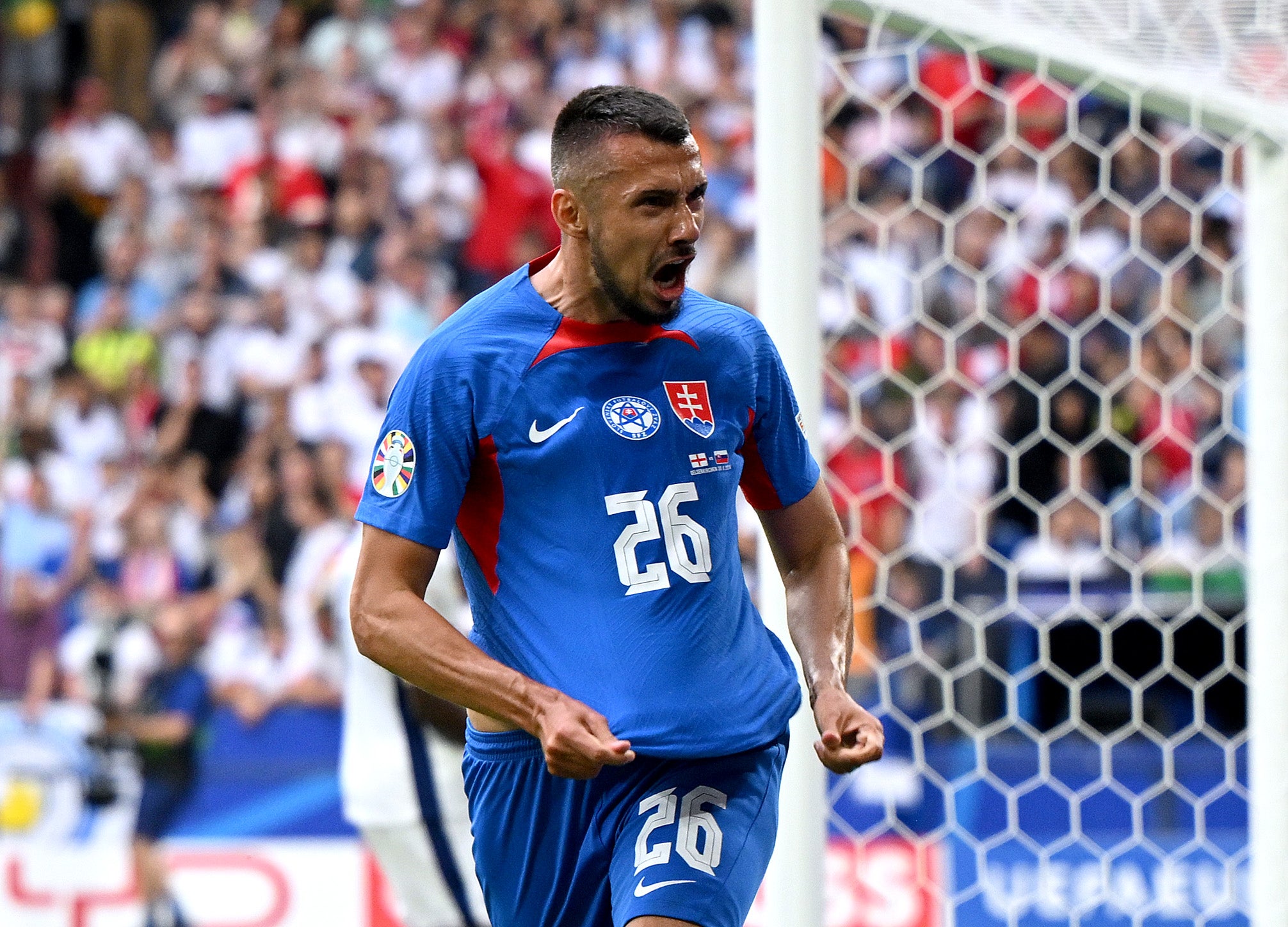 Ivan Schranz of Slovakia celebrates scoring his team's goal