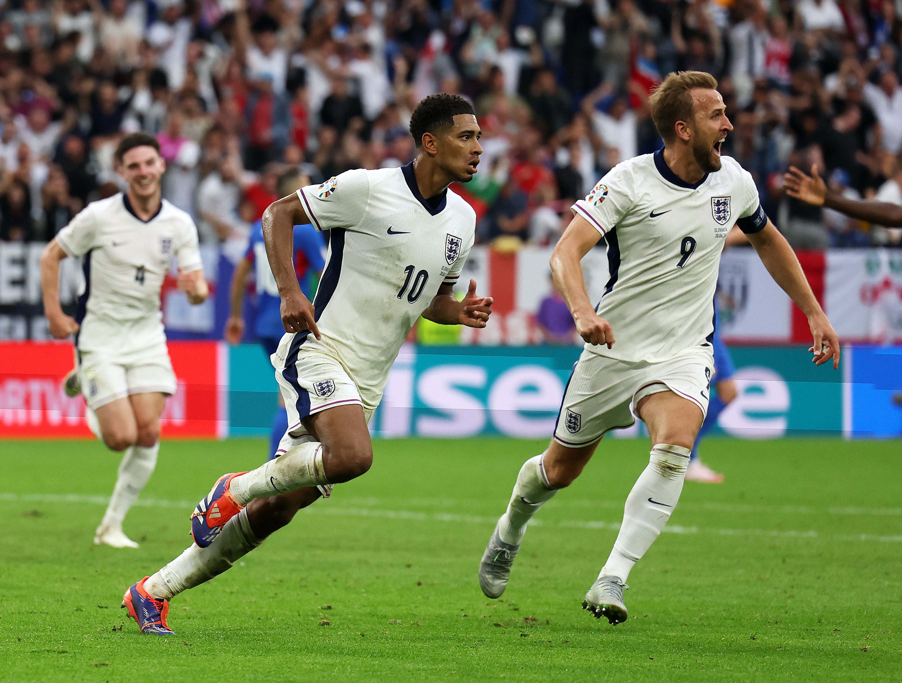 Bellingham celebrates with Kane after scoring a last second equaliser