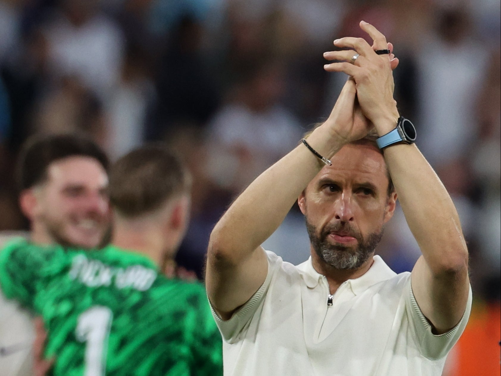 England manager Gareth Southgate applauds the fans after Sunday’s 2-1 win over Slovakia in Gelsenkirchen