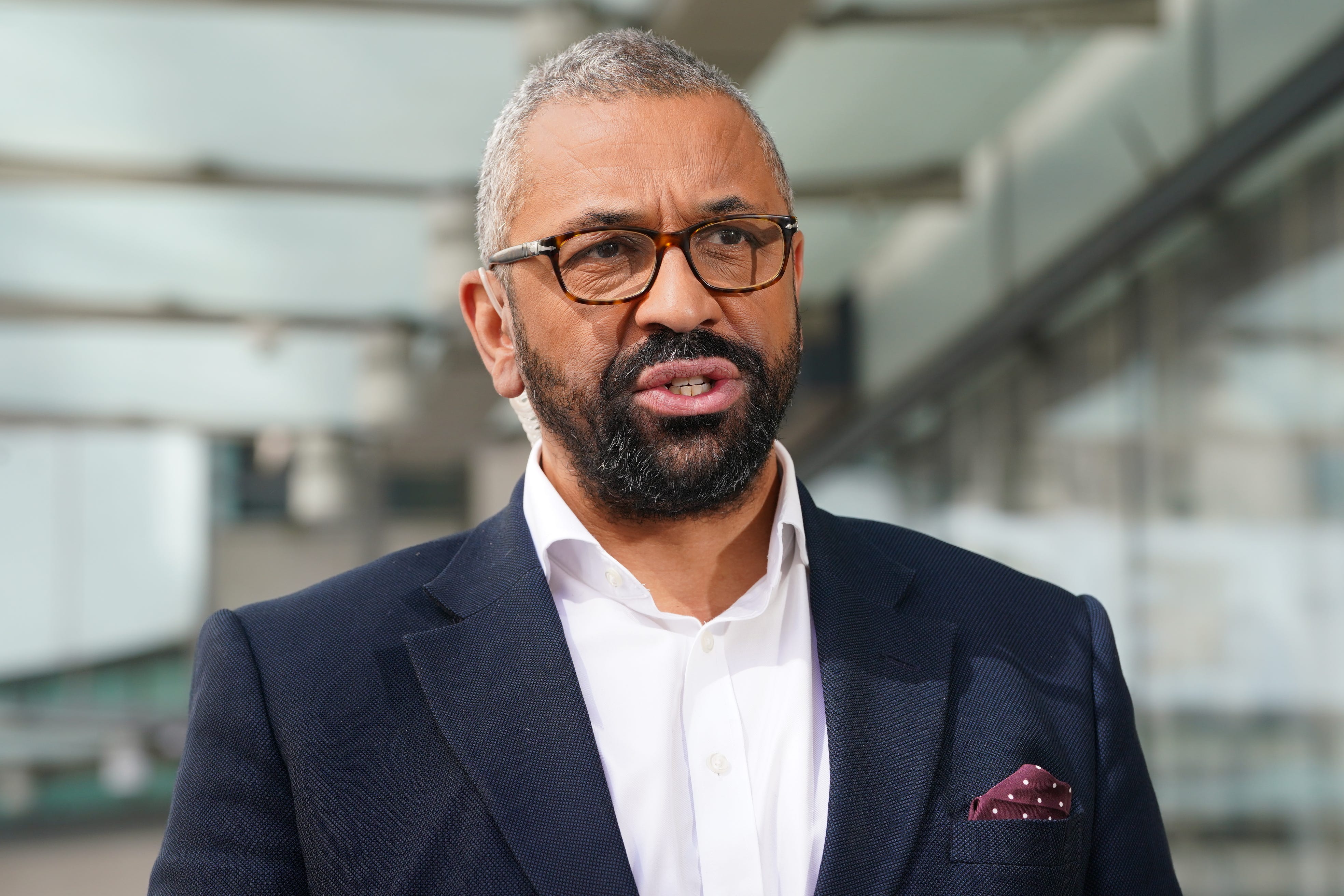 Home Secretary James Cleverly speaking to the media outside BBC Broadcasting House after appearing on Sunday with Laura Kuenssberg (Lucy North/PA)