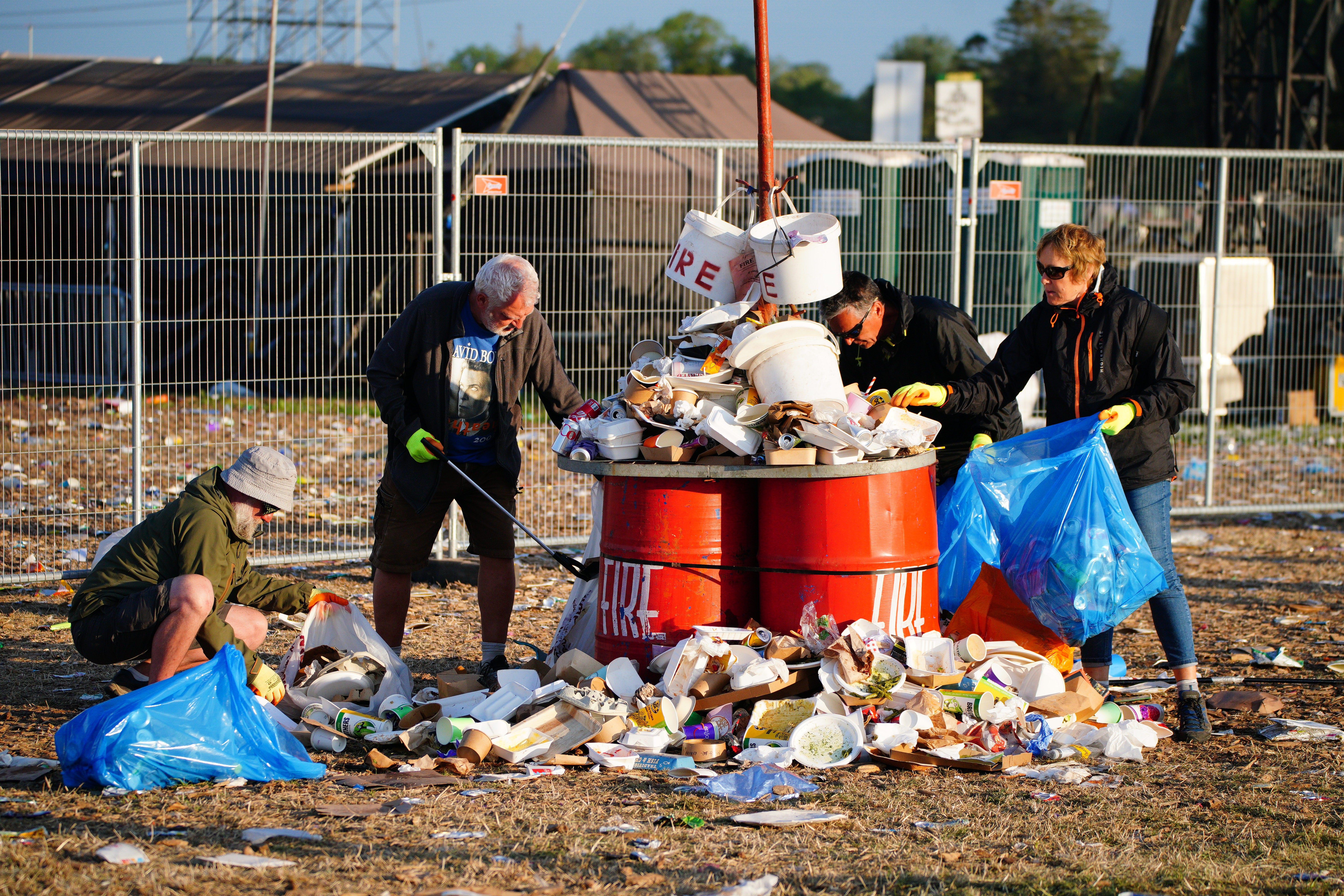 A mix of volunteers and paid workers take on the cleanup job