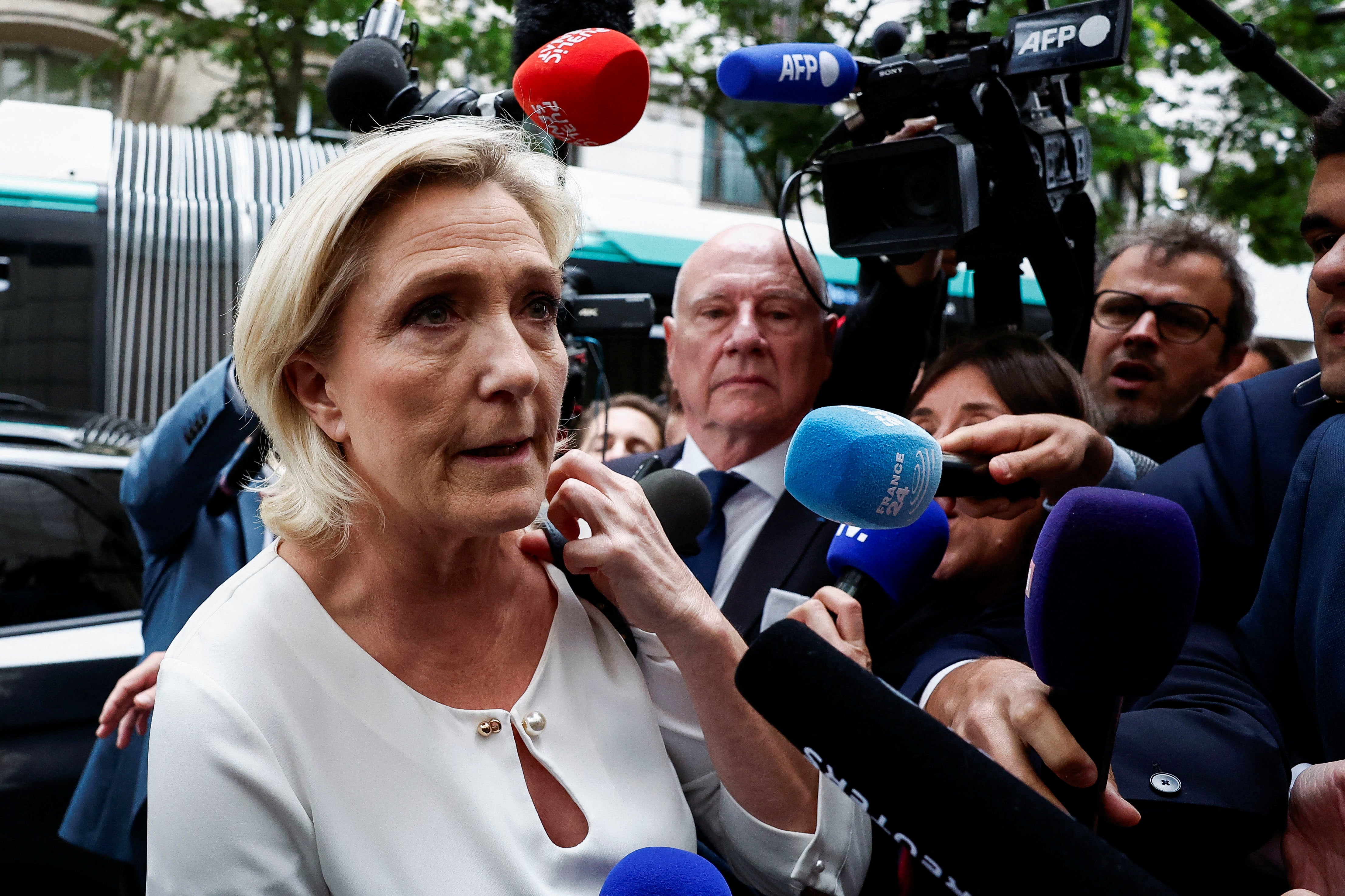 Marine Le Pen, member of parliament and French far-right National Rally (Rassemblement National - RN) party leader, arrives at the RN party headquarters in Paris