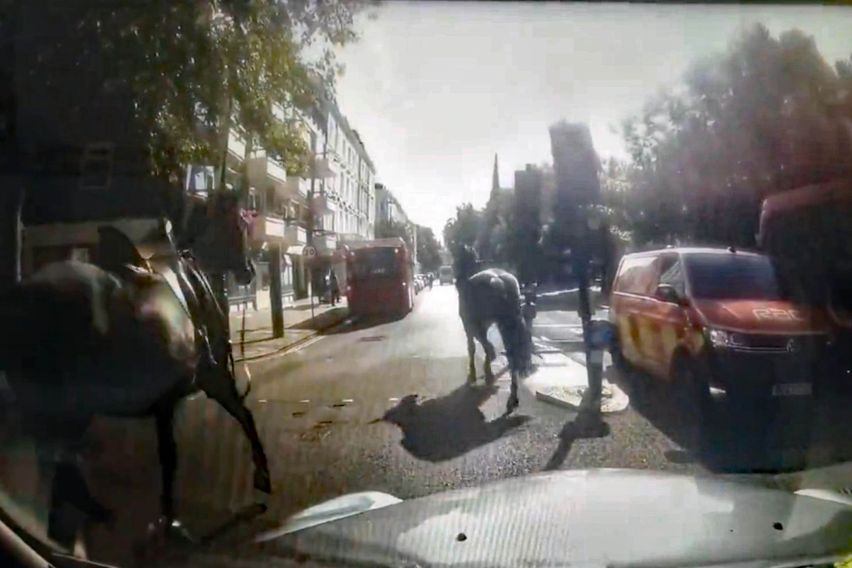 Dashcam footage of two of three military horses which bolted through central London on Monday morning (@Davenoisome/PA)