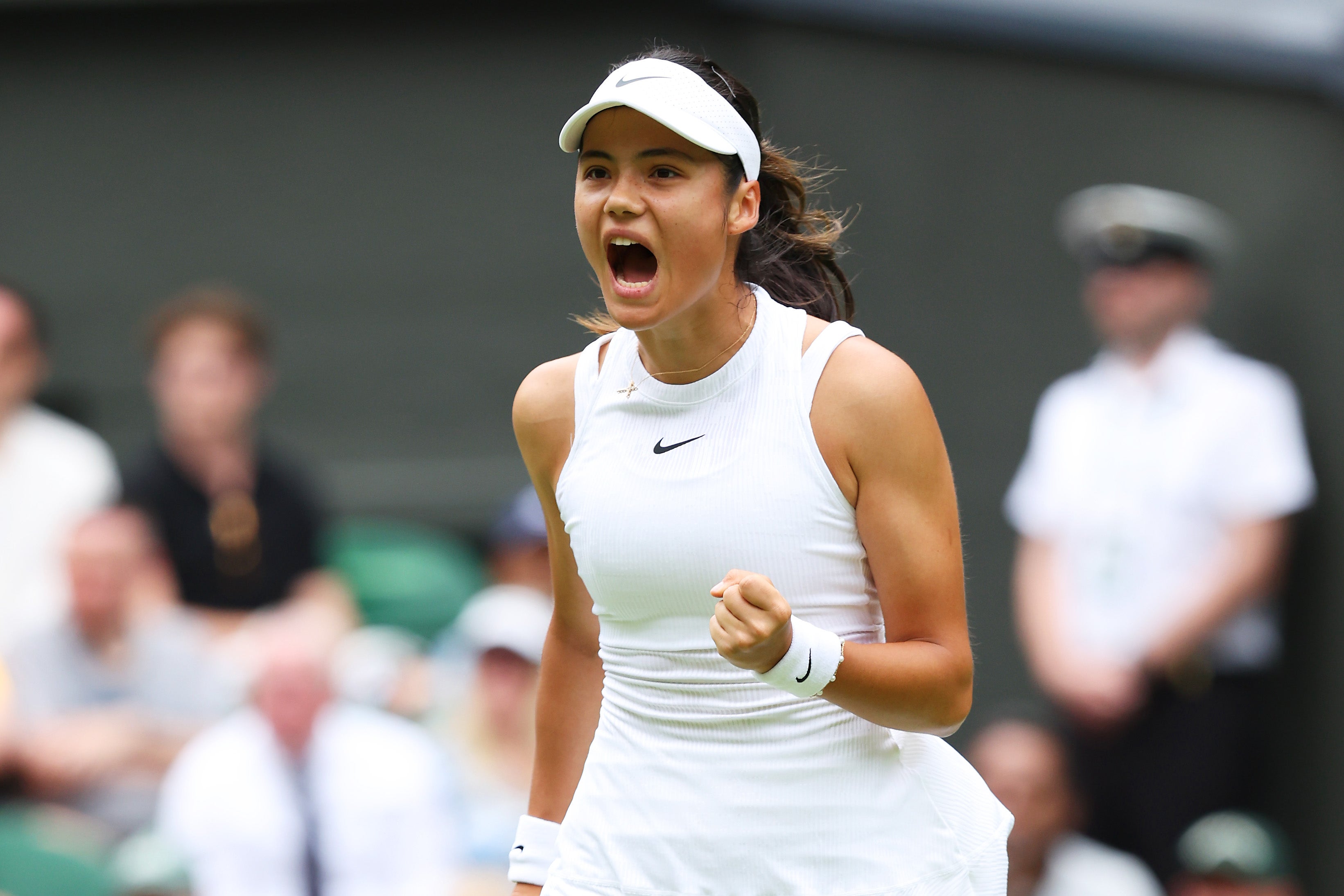 Emma Raducanu won on her return to Wimbledon in straight sets on Monday