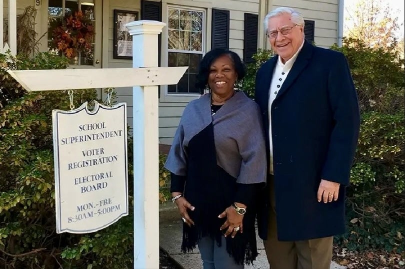 George Stepp (right) was killed in a freak crash in a McDonald’s parking lot in Texas. He served as superintendent of school in Fairfax, Virginia, 1996-2007 and is seen with one of his successors, Phyllis Pajardo, outside the school’s office